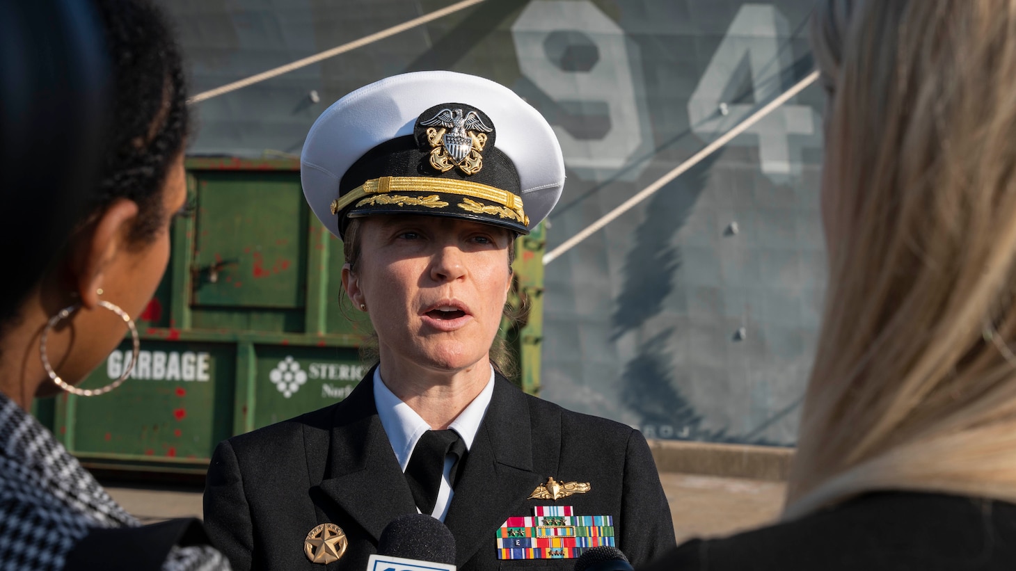 Cmdr. Katie Jacobson, commanding officer of the guided-missile destroyer USS Nitze (DDG 94), answers questions from local reports during a press conference after Nitze returned to Naval Station Norfolk following a scheduled deployment April 5, 2023.