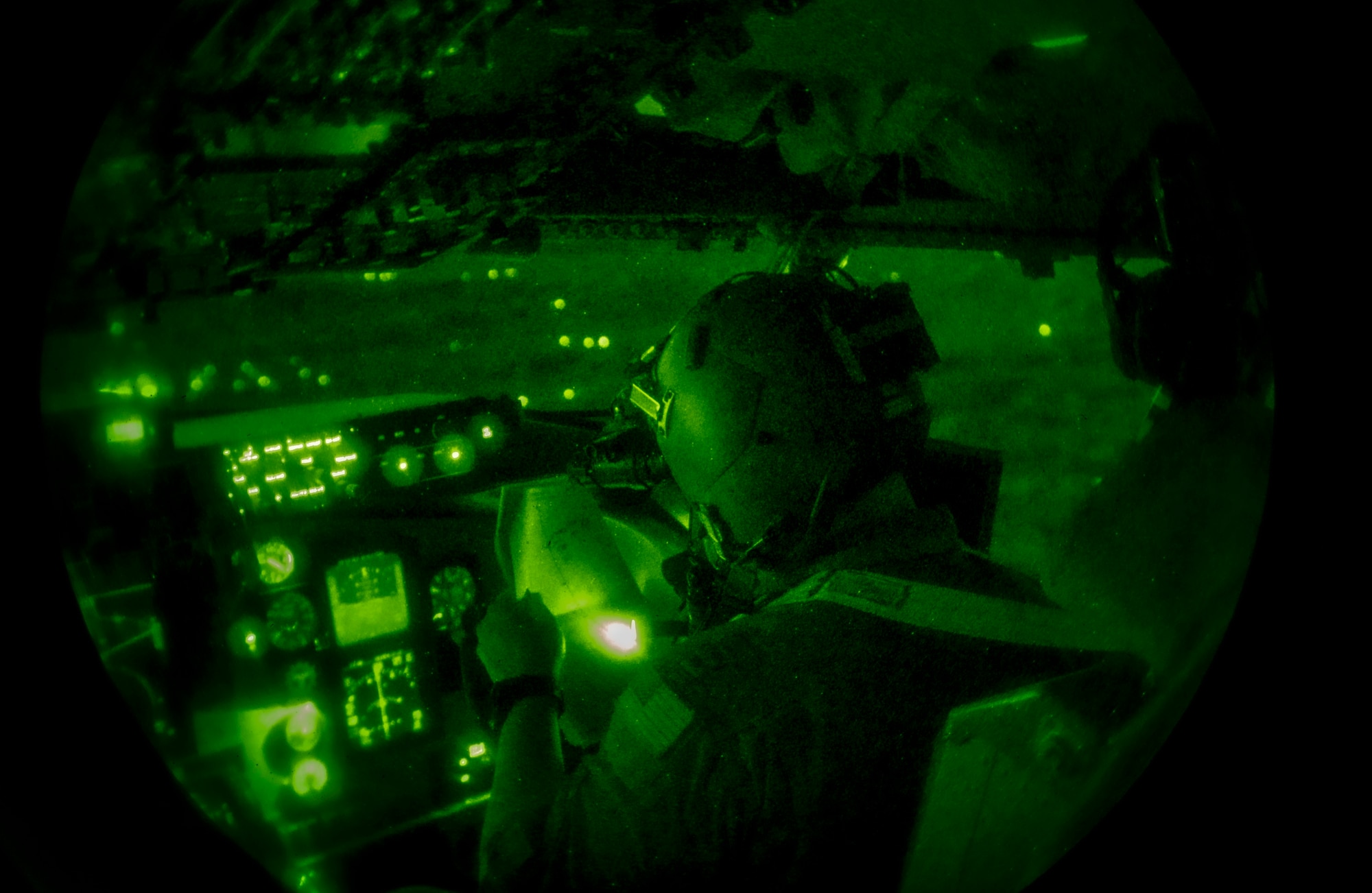 U.S. Air Force Capt Christopher Perkins, pilot assigned to 92nd Air Refueling Squadron, reviews the flight route while performing nighttime tactical approaches and departures (TADS) during the threats and tactics phase of the 509th Weapons School (WPS) course, March 17, 2023. During this training phase the 509th WPS students are evaluated on their ability to fly their TADs, take sufficient notes to effectively reconstruct the sortie, analyze the mission objectives, debrief the mission, and produce instructional fixes for areas that did not meet mission objectives. (U.S. Air Force photo by 2nd Lt. Ariana Wilkinson)