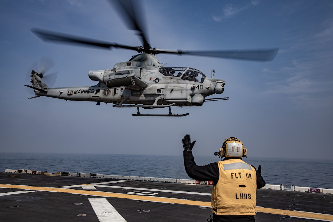 U.S. Marine Corps Col. Samuel Meyer, commanding officer of the 13th Marine Expeditionary Unit, co-pilots an AH-1Z Venom helicopter during take-off from the amphibious assault ship USS Makin Island (LHD 8), March 29, 2023. The 13th MEU is embarked with the Makin Island Amphibious Ready Group, comprised of the Makin Island and the amphibious transport docks USS John P. Murtha (LPD 26) and USS Anchorage (LPD 23), and operating in the U.S. 7th Fleet area of operations. 7th Fleet is the U.S. Navy's largest forward deployed numbered fleet, and routinely interacts and operates with Allies and partners in preserving a free and open Indo-Pacific region.