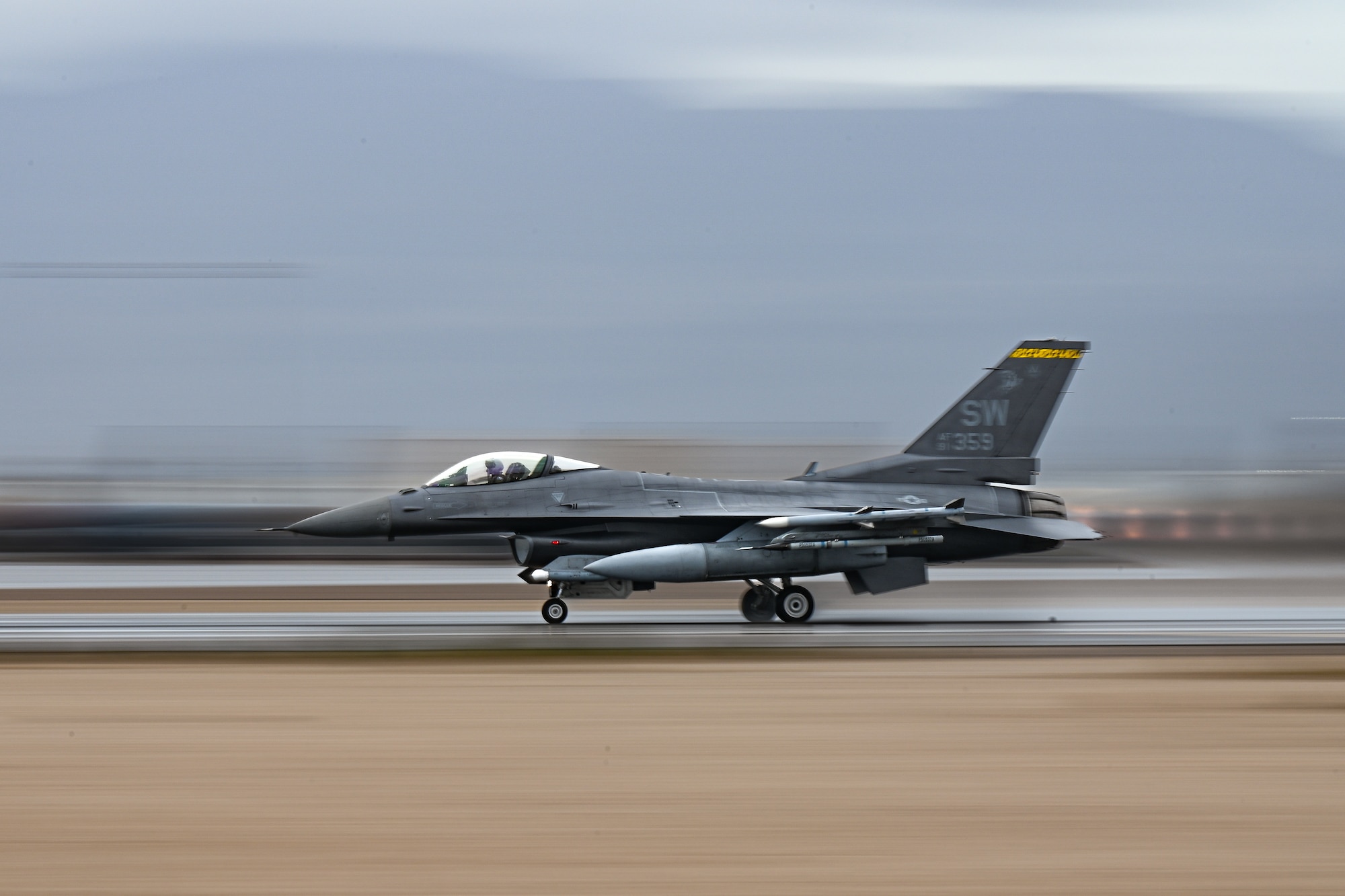 A U.S. Air Force F-16C Fighting Falcon assigned to the 79th Fighter Squadron at Shaw Air Force Base, S.C., takes off from the flightline during exercise Red Flag-Nellis (RF-N) 23-2 at Nellis Air Force Base, Nevada, March 14, 2023. RF-N 23-2 provides a challenging and dynamic environment for the 20th Fighter Wing pilots and aircrew by bringing air forces and airframes from around the world together multiple times a year to integrate as a team during simulated wartime operations, ensuring seamless interoperability for potential future conflicts. (U.S. Air Force photo by Staff Sgt. Madeline Herzog)