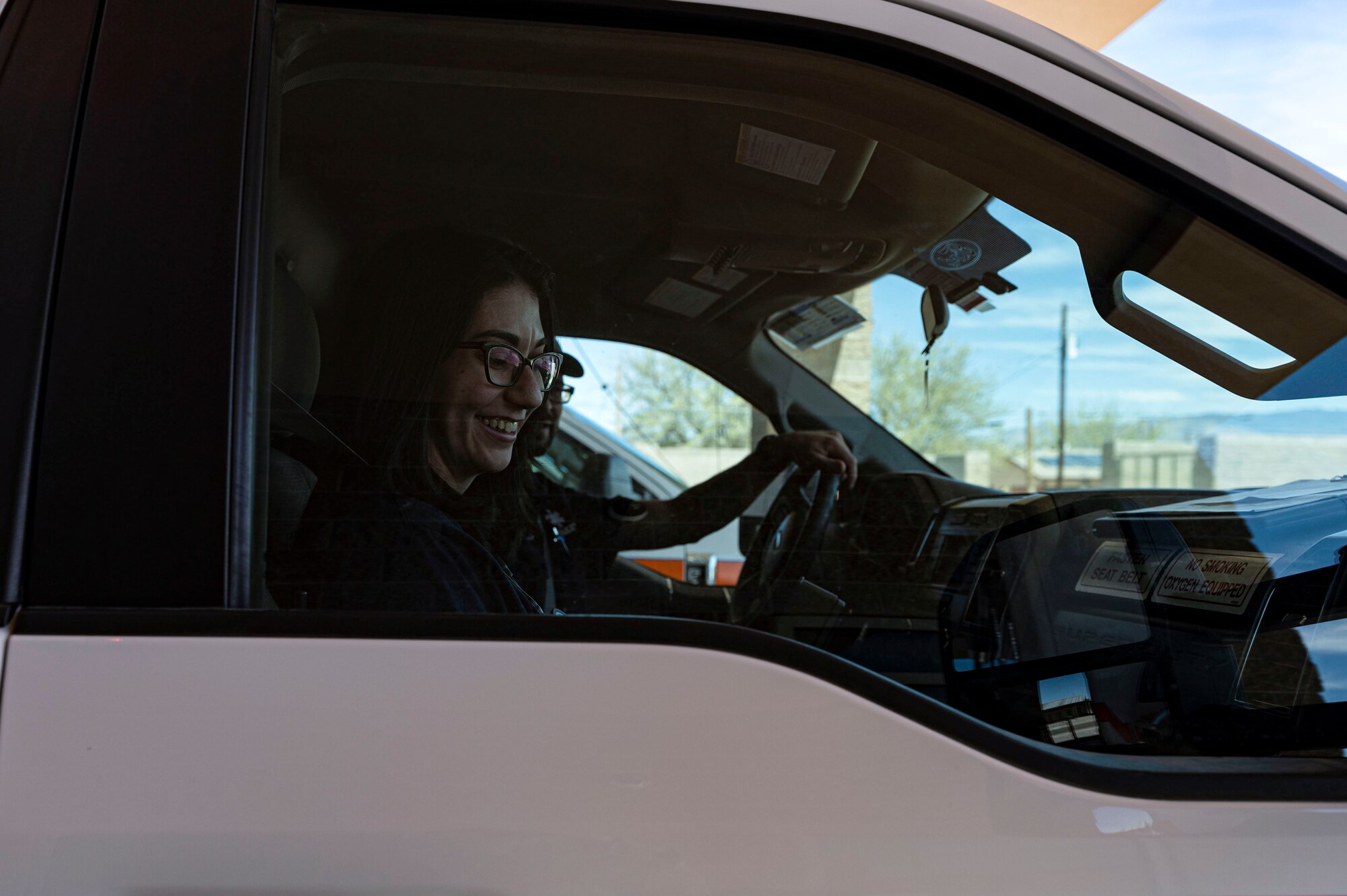 Azriel O’Neal, 49th Medical Group paramedic, and Michael Curtis, 49th MDG emergency medical technician, drive off in an ambulance at Holloman Air Force Base, New Mexico, April 3, 2023. Both the EMTs and paramedics at Holloman are responsible for providing first-aid care and transportation for patients to hospitals or other nearby healthcare facilities. (U.S. Air Force photo by Airman 1st Class Isaiah Pedrazzini)