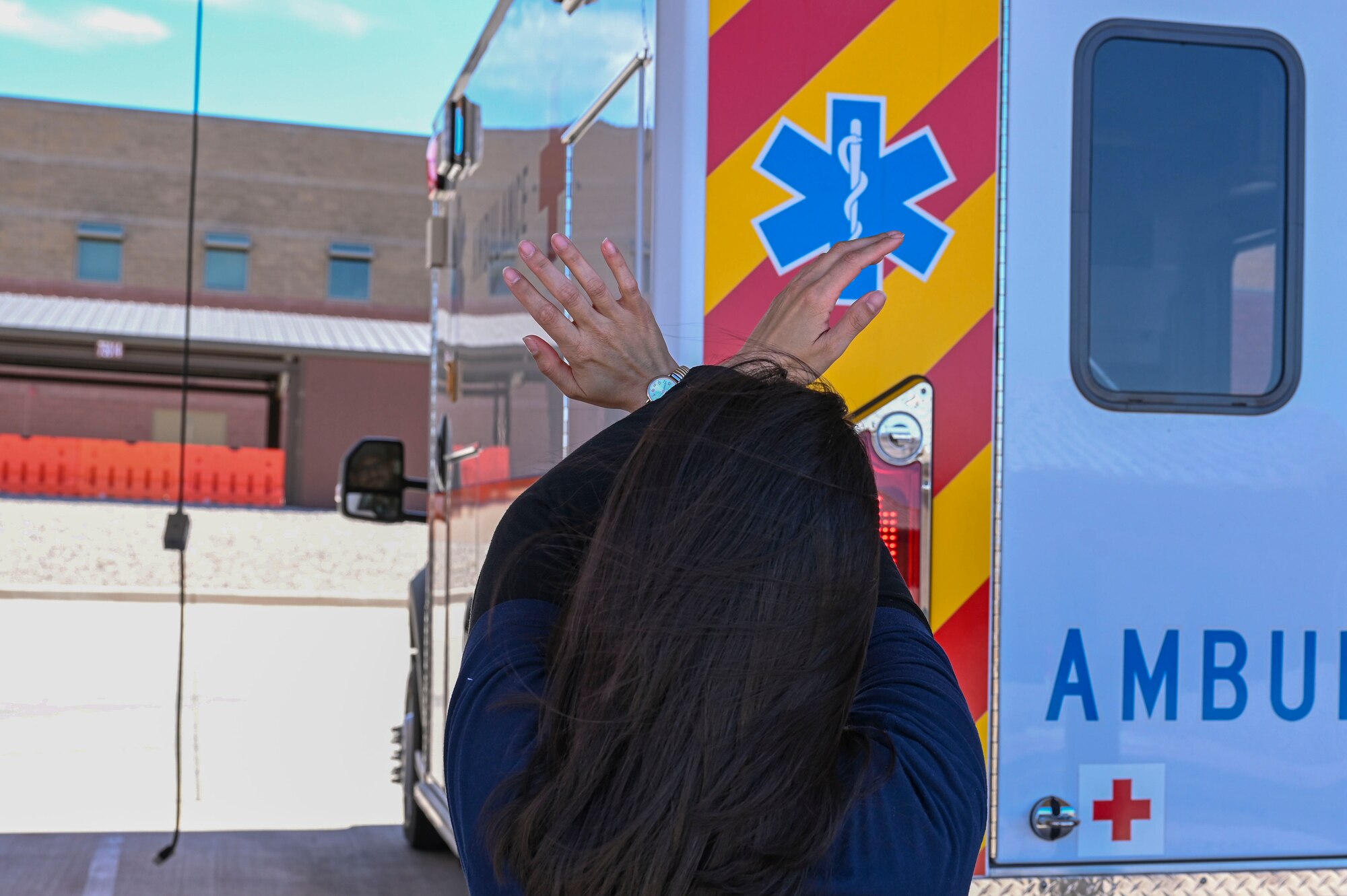 Azriel O’Neal, 49th Medical Group paramedic, helps Michael Curtis, 49th MDG emergency medical technician backup an ambulance at Holloman Air Force Base, New Mexico, April 3, 2023. Ambulances are medically equipped to provide emergency care for sick or injured patients and are utilized by EMTs and paramedics to transport patients to hospitals. (U.S. Air Force photo by Airman 1st Class Isaiah Pedrazzini)