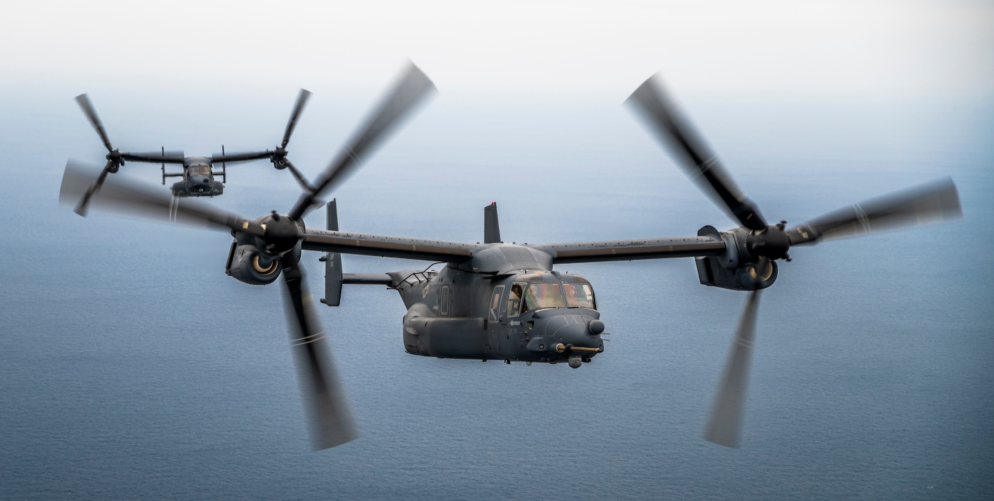 CV-22 Ospreys assigned to the 21st Special Operations Squadron (SOS) approach an MC-130J Commando II for aerial refueling over the Sea of Japan, Mar. 17th, 2023.
