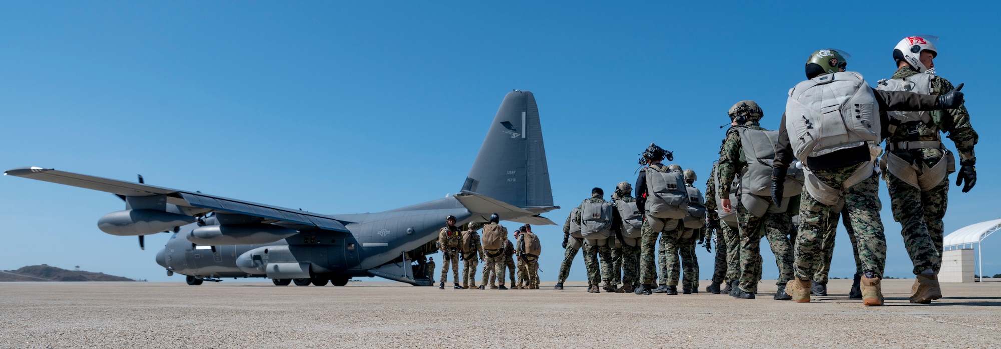 U.S. Army and Republic of Korea Soldiers begin boarding an MC-130J Commando II to conduct High Altitude Low Opening (HALO) jump training in support of Freedom Shield 23 at Kunsan Air Base, Republic of Korea, Mar. 15, 2023