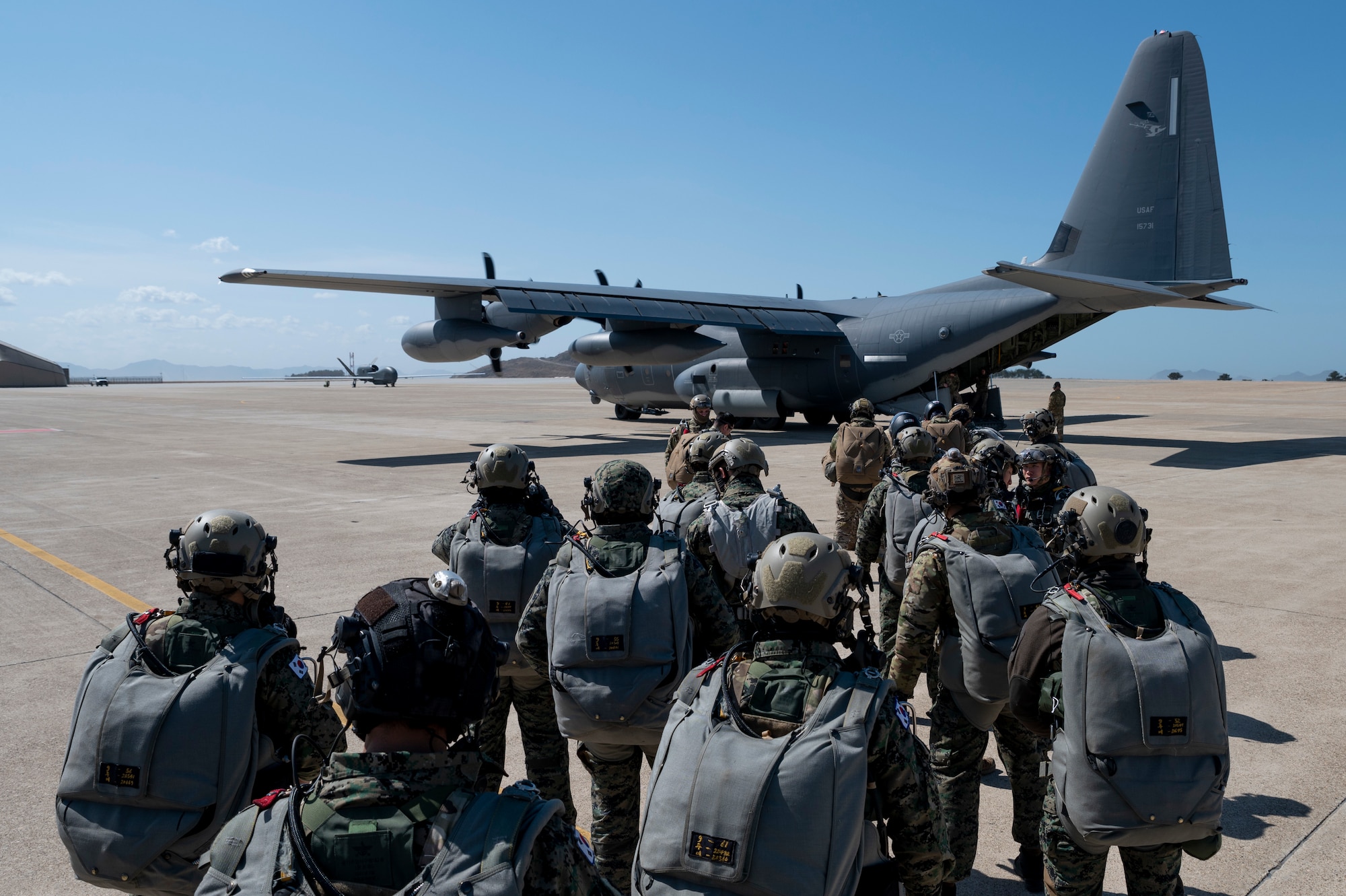 U.S Army and Republic of Korea Soldiers begin boarding an MC-130J Commando II to conduct High Altitude Low Opening (HALO) jump training in support of Freedom Shield 23 at Kunsan Air Base, Republic of Korea, Mar. 15, 2023.