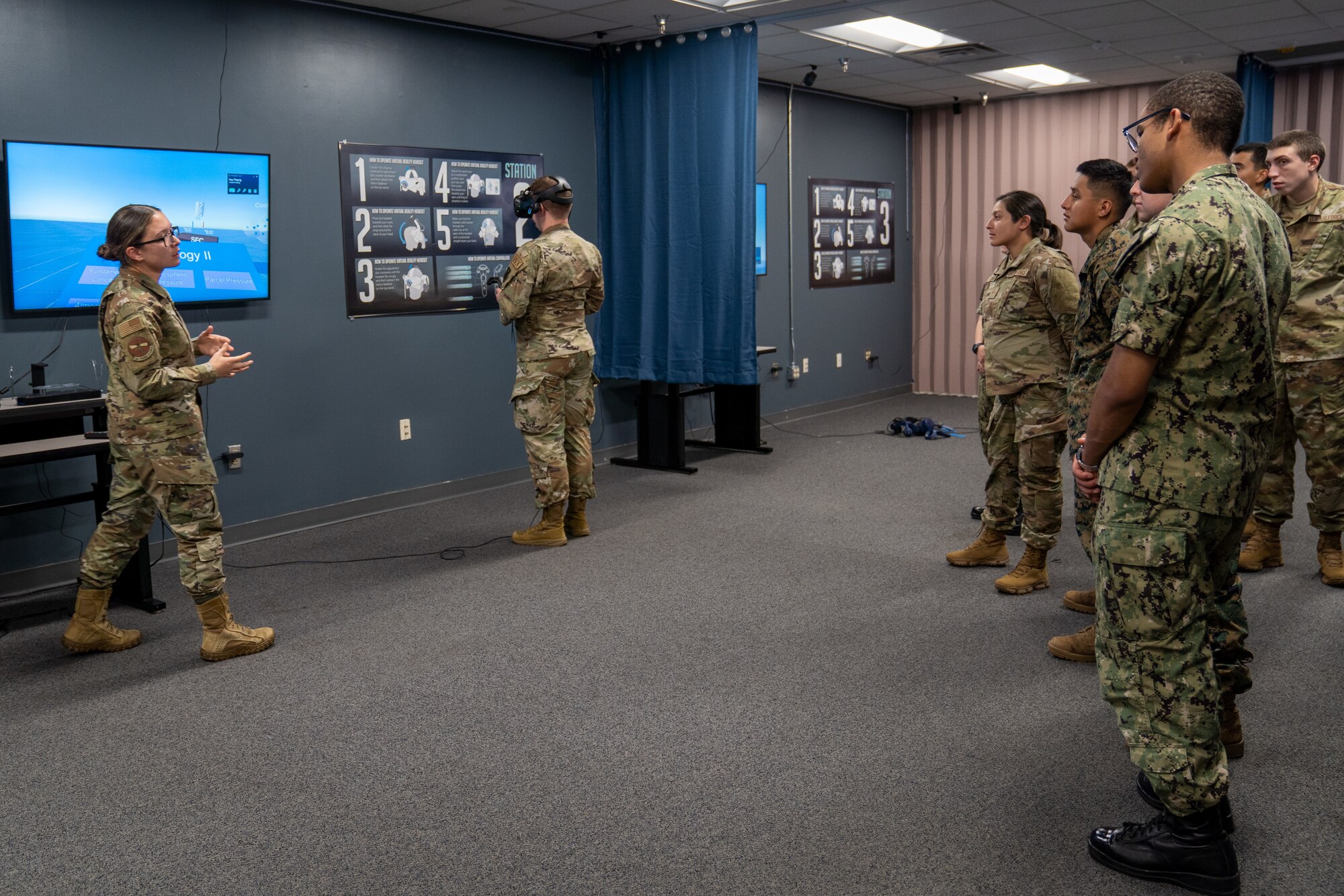 Instructors from the 335th Training Squadron teach students during the 81st Training Group Immersion Tour at the Joint Weather Training Facility on Keesler Air Force Base, Mississippi, April 4, 2023.
