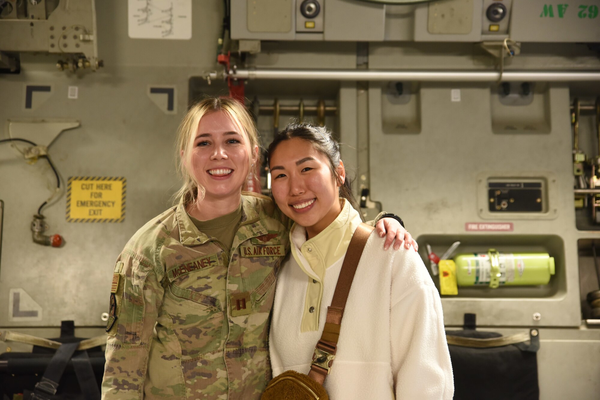 U.S. Air Force Capt. Ashley McEneaney, a pilot with the 8th Expeditionary Airlift Squadron, is welcomed home from deployment by a friend at Joint Base Lewis-McChord, Washington, March 31, 2023. The deployment was the 62d Airlift Wing’s first under the new Air Force Force Generation Model in support of U.S. Central Command, U.S. European Command and U.S. Africa Command operations. (U.S. Air Force Photo by Airman 1st Class Kylee Tyus)