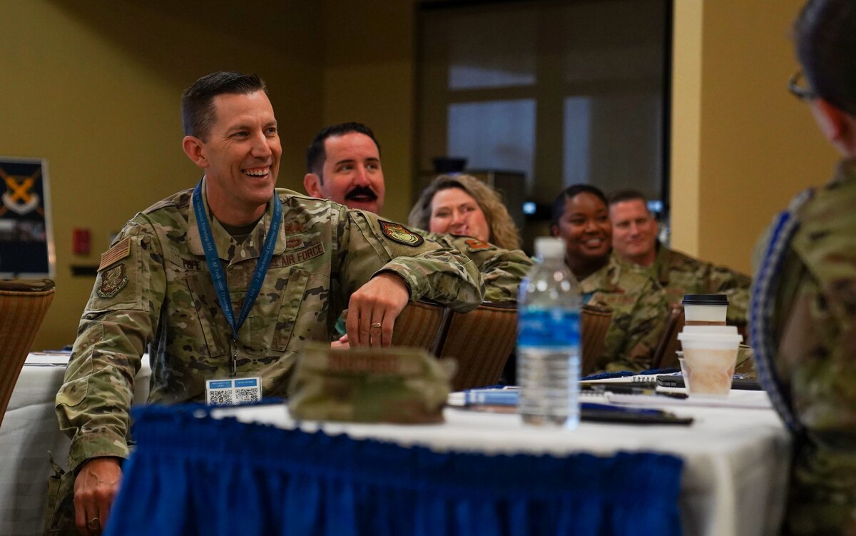 U.S. Air Force Col. Billy Pope, 81st Training Wing commander, listens as introductions are made around the room at Technical Training 101 in the Bay Breeze Event Center on Keesler Air Force Base, Mississippi, March 28, 2023.