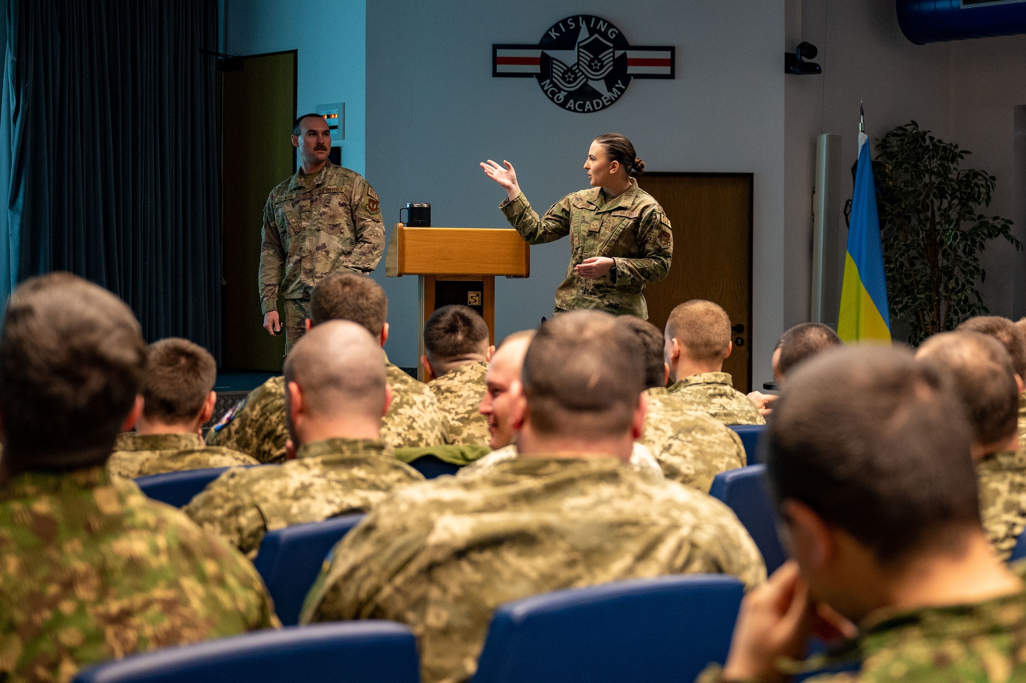 U.S. Air Force Senior Airman Viktoria Senkiv translates course material to Ukrainian at the Inter-European Air Force Academy at Kapaun Air Station, Germany, March 16, 2023. Senkiv, a Ukrainian native, spent three weeks translating IEAFA class material to 49 Ukrainian Air Force and National Guard members. (U.S. Air Force photo by Tech. Sgt. Steven Adkins)