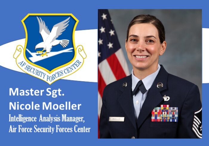 Photo of Moeller with AFIMSC shield