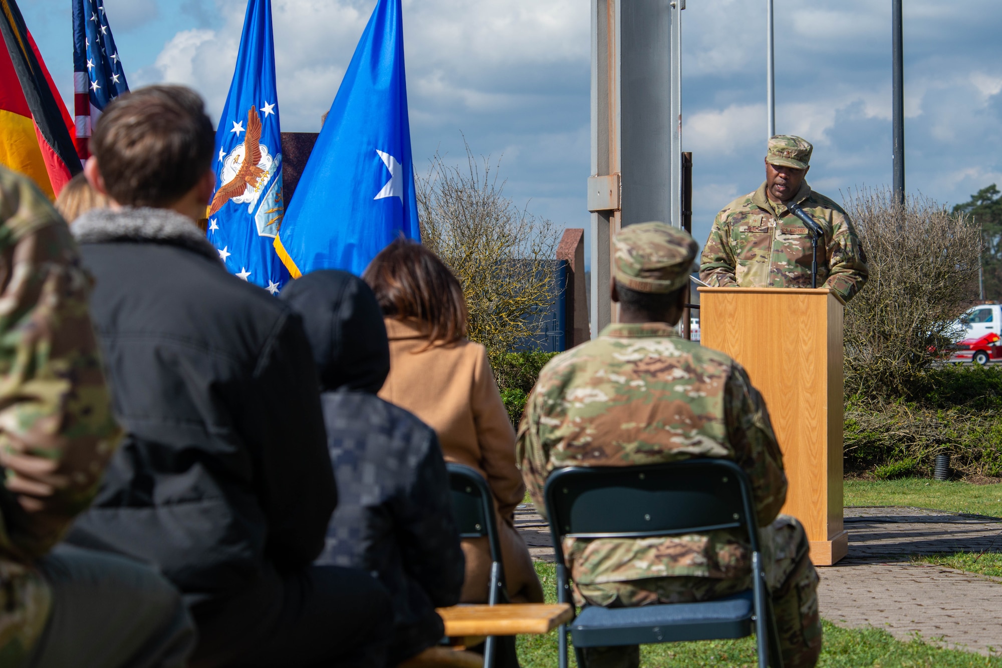 Base commander speaks at a memorial ceremony