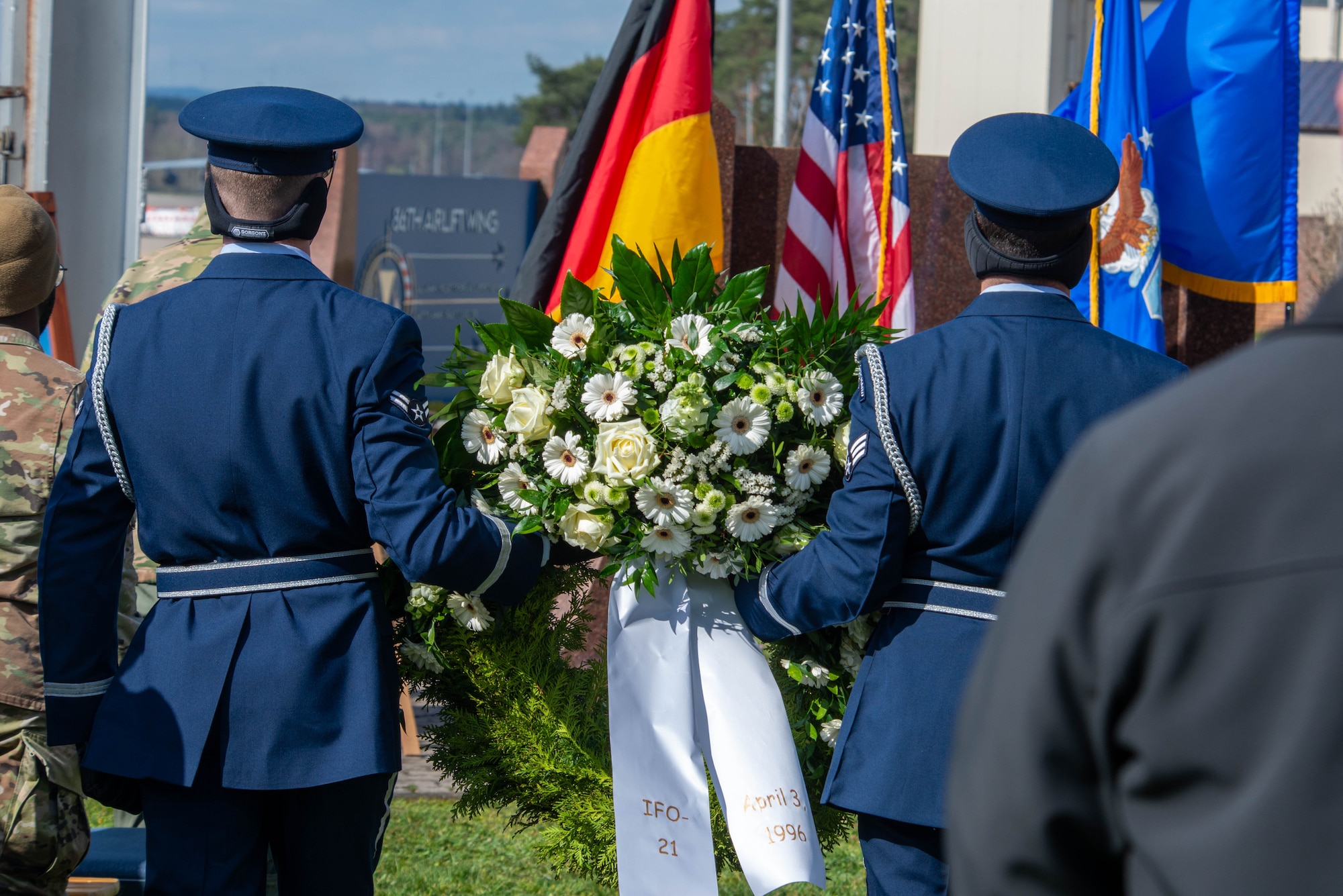 Honor guard Airmen lay the memorial wreath
