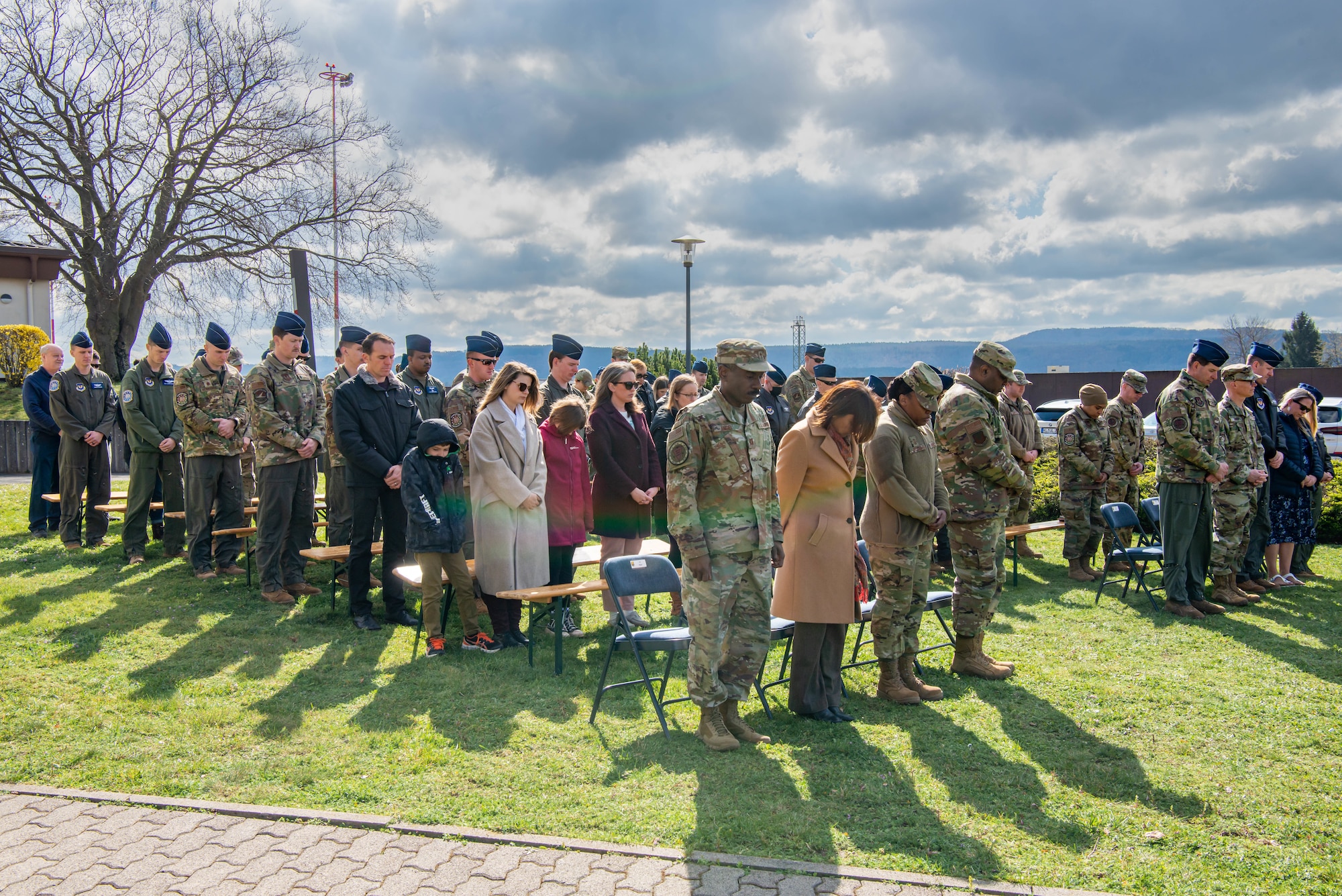 Airmen stand for a moment of silence