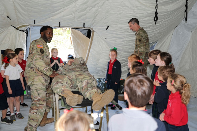 Teaching kids how the Army Reserve treats 'boo-boos and owies'
