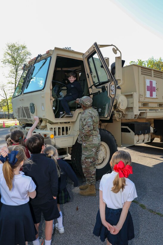 Teaching kids how the Army Reserve treats 'boo-boos and owies'