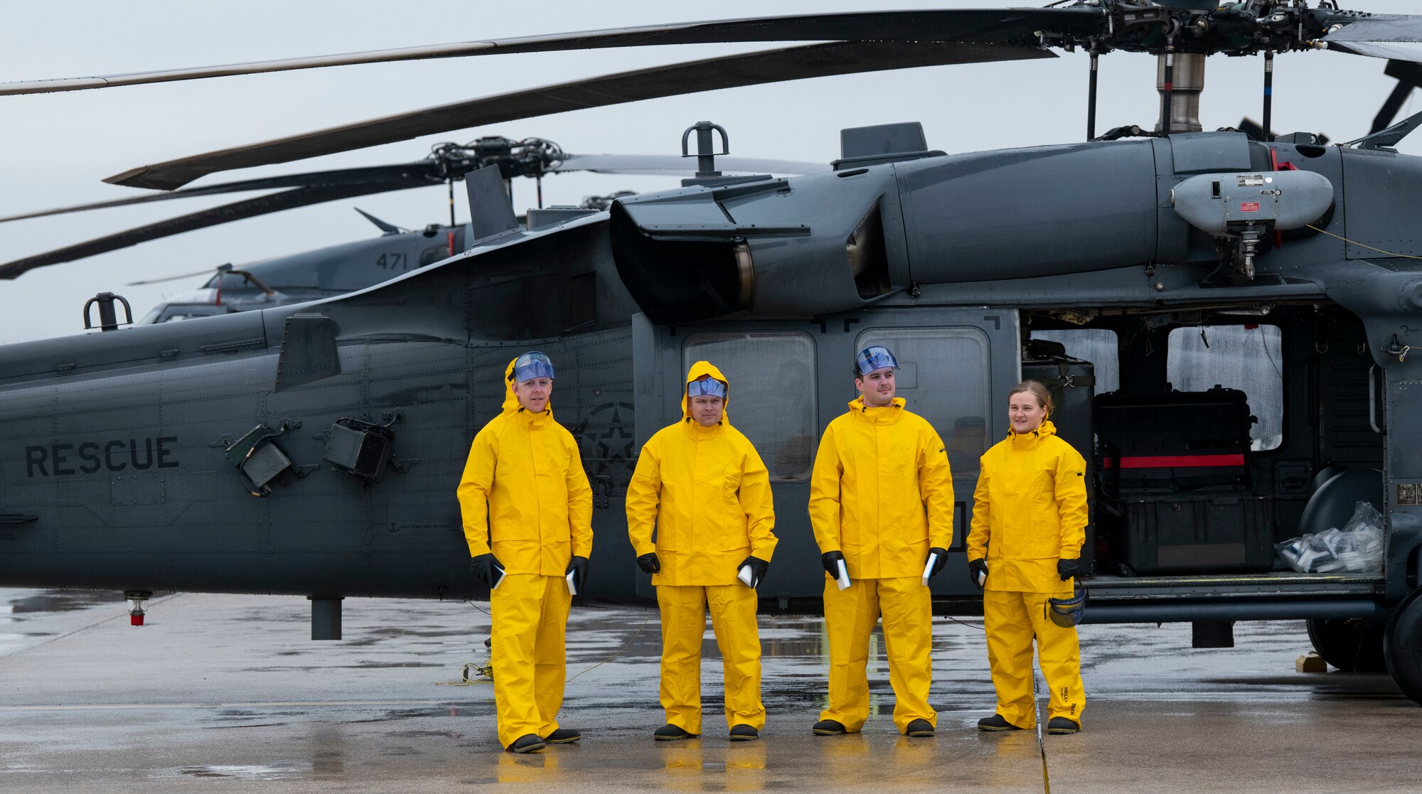 U.S. Air Force Chief Master Sgt. Chad Fry, 510th Fighter Generation Squadron senior enlisted leader, left, Col. Jason Mitchell, 31st Maintenance Group commander, middle-left Capt. Justin Berte, 56th Rescue Generation Squadron director of operations, middle-right, and 2nd Lt. Constance Stormzand, 555th Fighter Generation Squadron sortie support flight commander, right, pose for a photo in front of an HH-60G Pave Hawk helicopter as part of an immersion tour