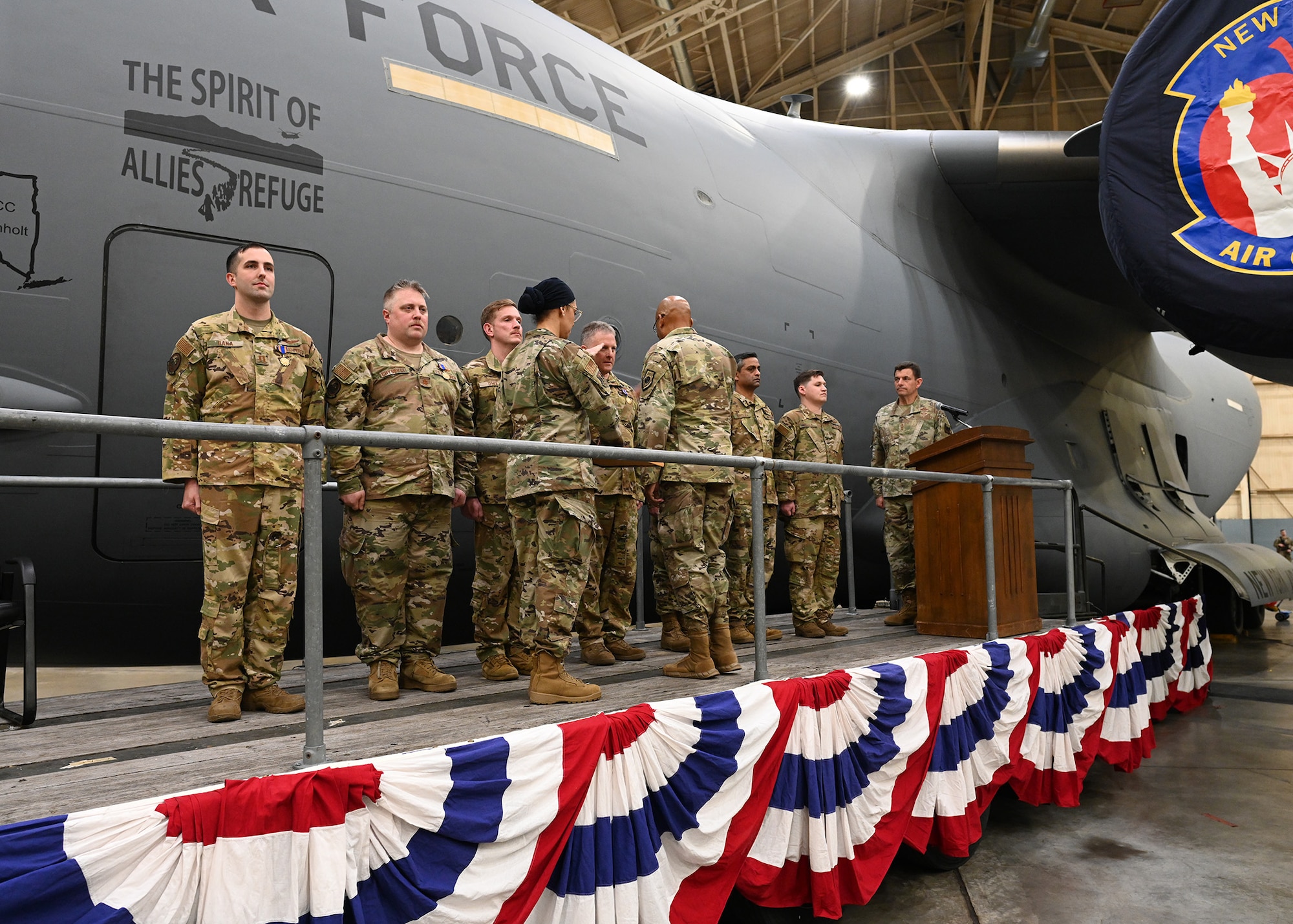 U.S. Air Force Chief of Staff Gen. CQ Brown Jr. presents the aircrew led by U.S. Air Force Capt. Robert Dana with the Air Medal during an award ceremony at Stewart Air National Guard Base, New York, April 1, 2023. Seventeen Airmen from the 105th were awarded the Air Medal for their actions during the August 2021 evacuation of Americans and Afghans from Afghanistan.