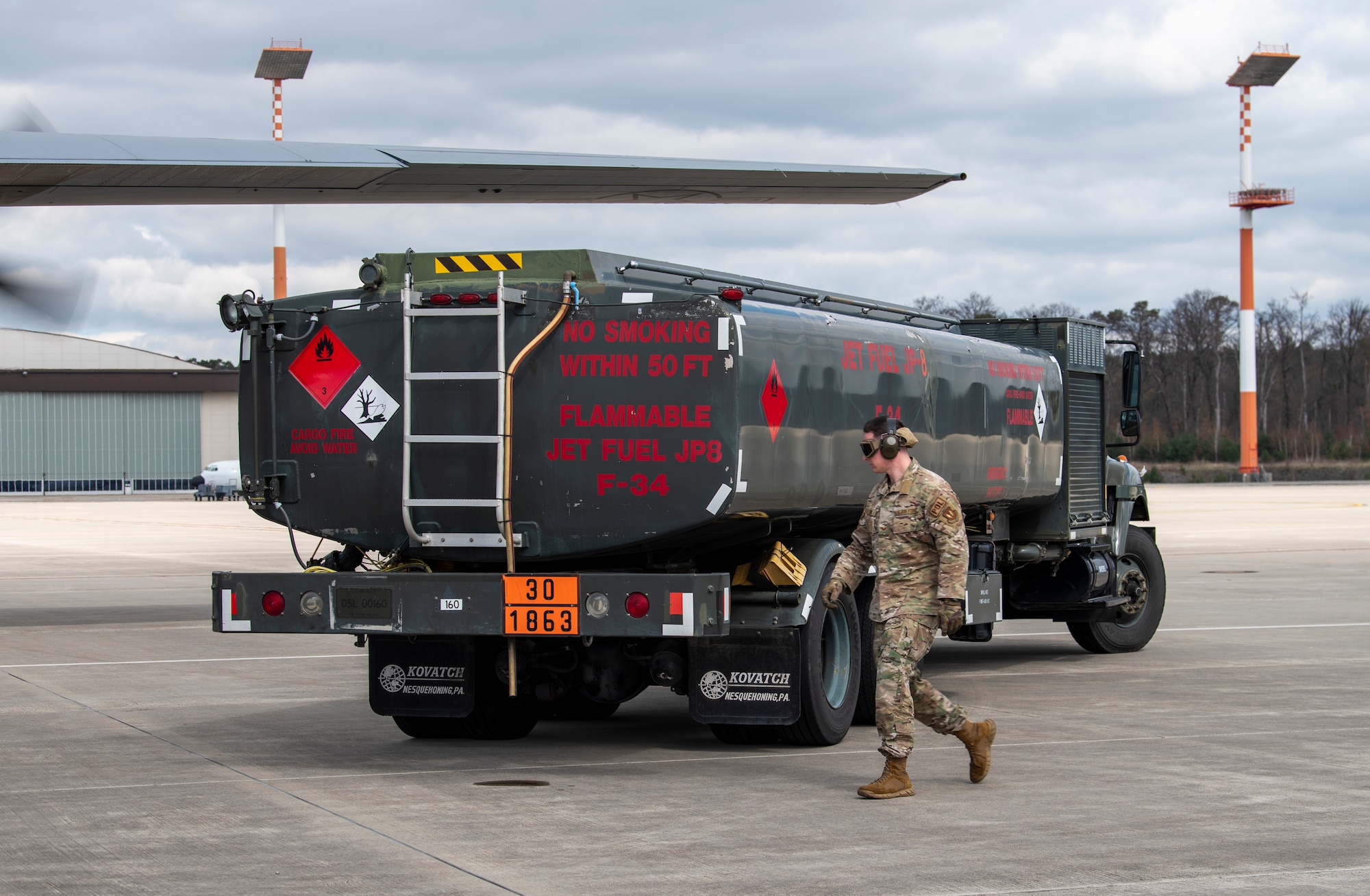 Airman inspects fuel truck