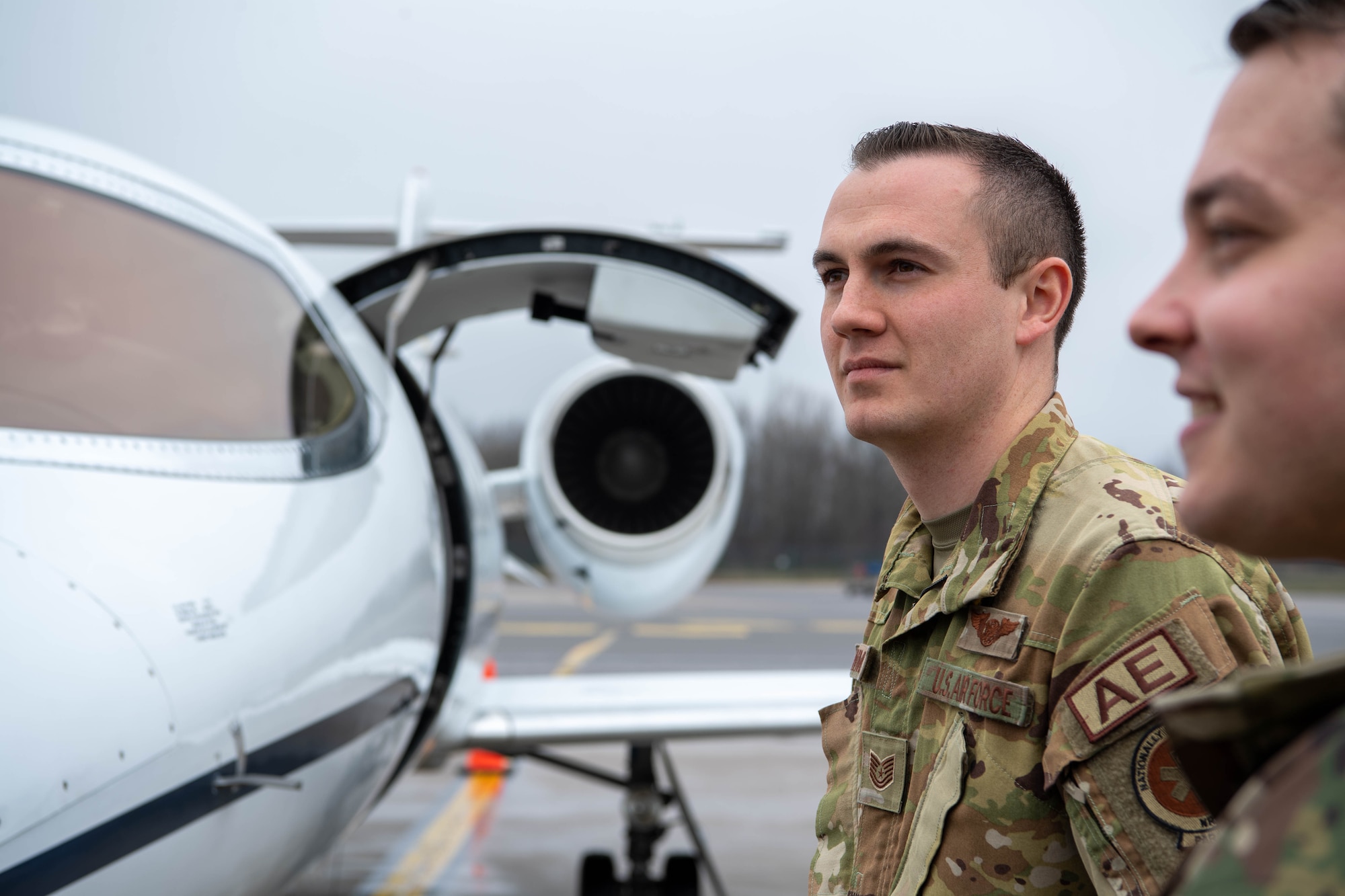 Tech. Sgt. Brendon Bowman, 86th Aeromedical Evacuation Squadron flight examiner and emergency medical paramedic, waits for a patient to arrive at Vilnius International Airport, Lithuania, April 6, 2023.