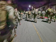 About 450 Soldiers, including two from U.S. Army Medical Logistics Command, took part in the Norwegian Foot March at Fort Belvoir, Virginia, April 2, 2023. The endurance test, inspired by the Norwegian Army and dating back to 1915, requires Soldiers to cover 18.6 miles with a 25-pound rucksack under a specified time based on age and gender. (U.S. Army photo courtesy Sgt. 1st Class Peung Kim)