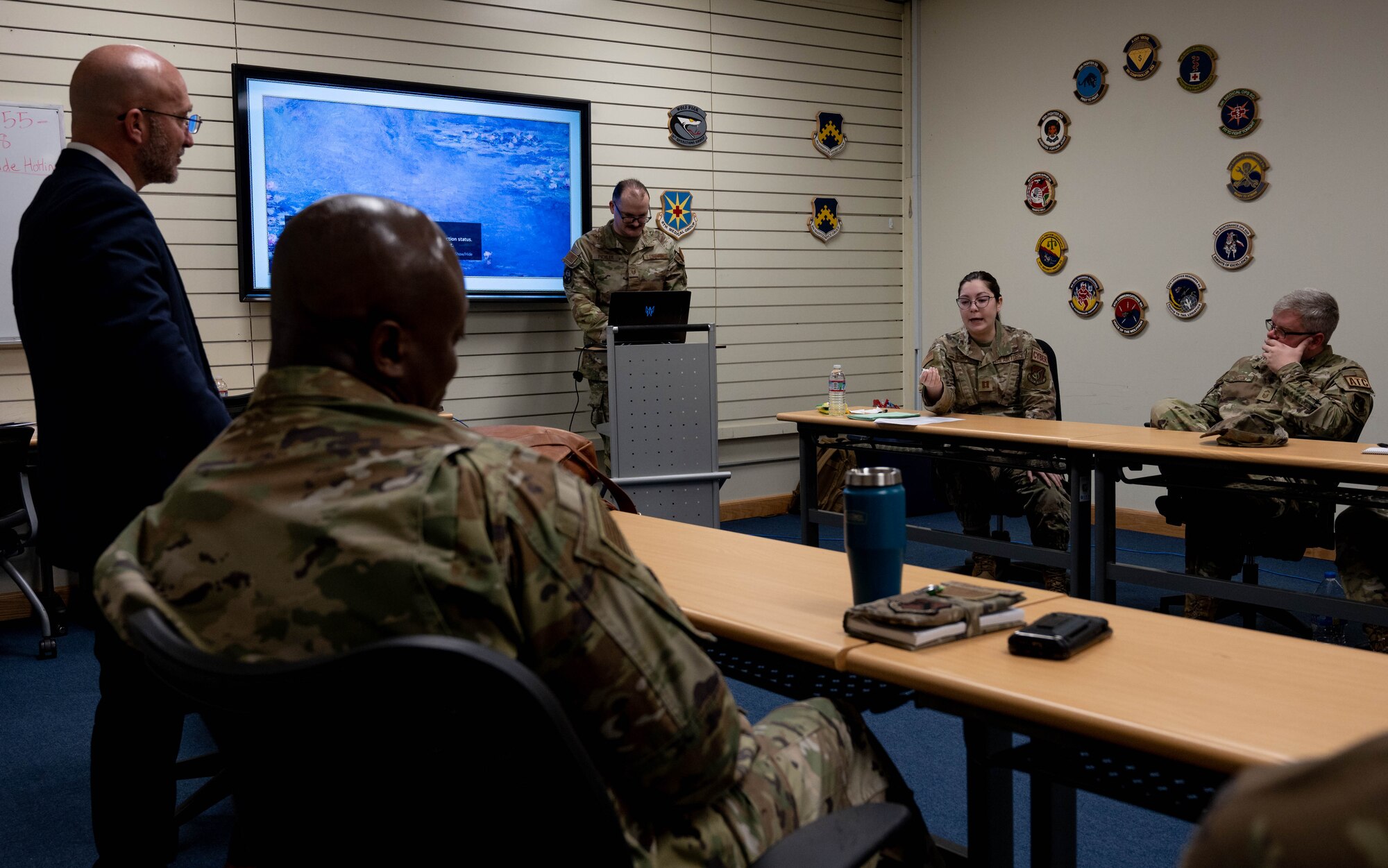 Capt. Kendra Booth (center right). 8th Communications Squadron Cyberspace Operations flight commander, speaks about her experience following Leading Inclusively Virtual Experience training at Kunsan Air Base, Republic of Korea, April 5, 2023.