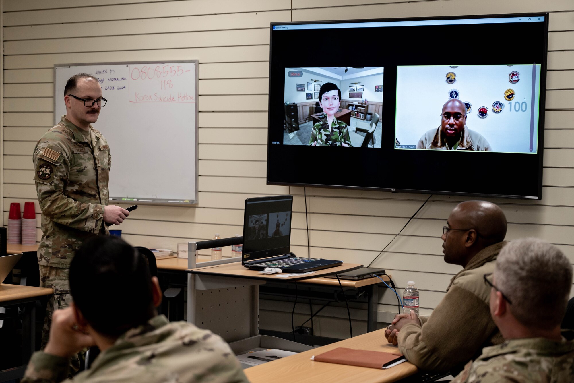 Master Sgt. Darren Pickler (left), 8th Fighter Wing Diversity, Equality, Inclusion & Accessibility program manager, speaks with Master Sgt. Stephen Adams-Smith (right), 8th Security Forces Squadron flight chief, during Leading Inclusively Virtual Experience training at Kunsan Air Base, Republic of Korea, April 5, 2023.