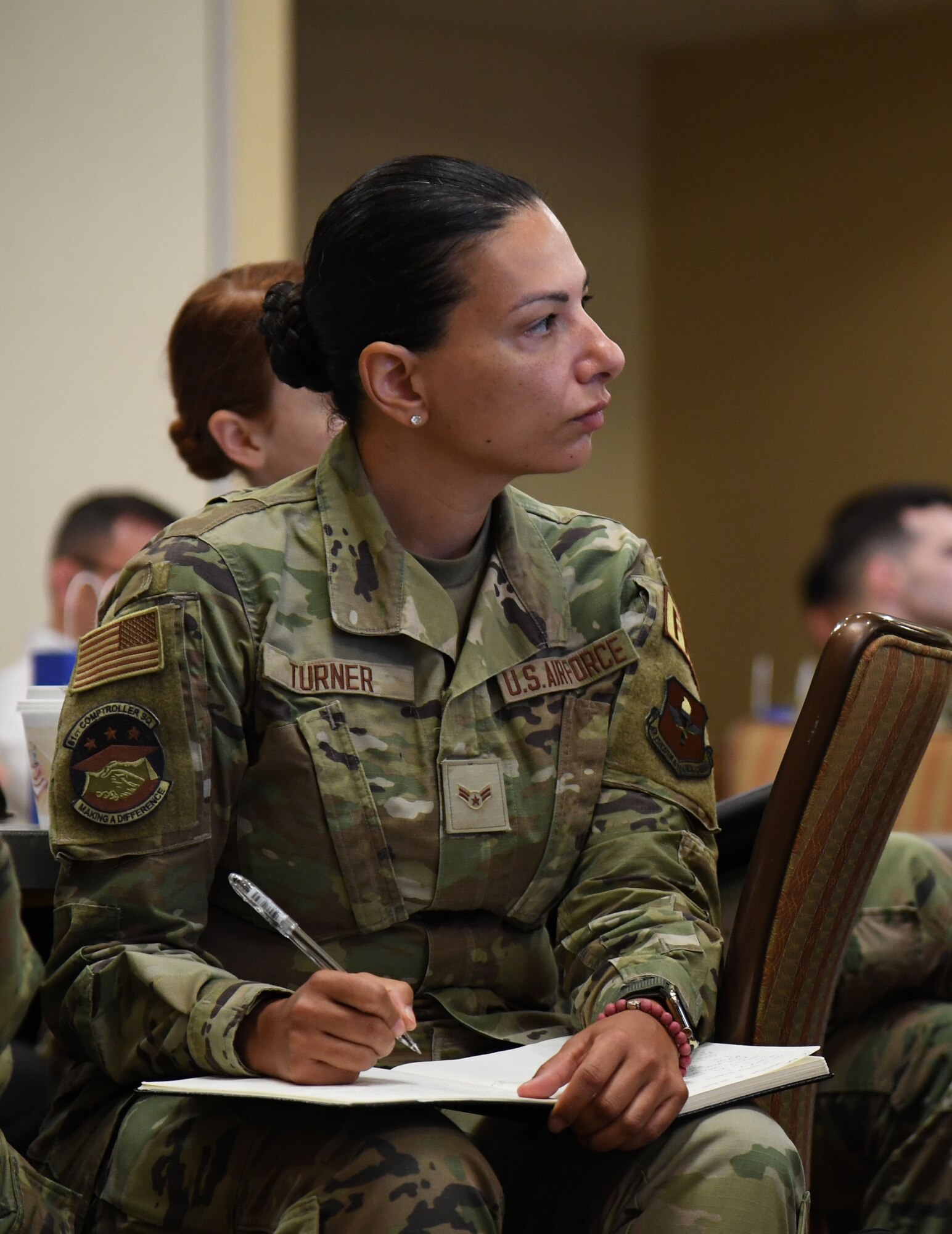 U.S. Air Force Airman 1st Class Gordana Turner, 81st Comptroller Squadron accounting technician, takes notes during LEAD-a-thon inside the Bay Breeze Event Center at Keesler Air Force Base, Mississippi, April 4, 2023.