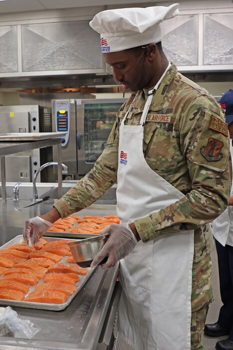 Airman prepares food