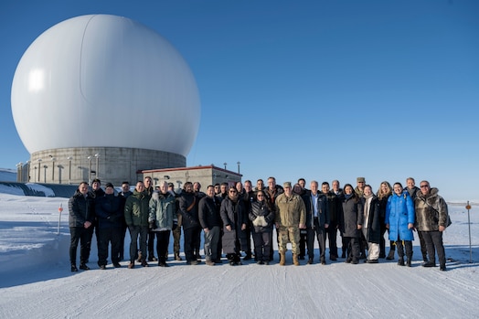  Chief of Space Operations U.S. Space Force Gen. Chance Saltzman and distinguished guests stand in front of a radar dome belonging to the 23rd Space Operations Squadron Detachment 1 at Pituffik Space Base, Greenland, April 5, 2023. Det. 1 falls under Space Delta 6 - Space Access and Cyberspace Operations. The Det. 1 mission is to provide telemetry, tracking and commanding operations to the U.S. and allied government satellite programs. (U.S. Space Force photo by Senior Airman Kaitlin Castillo)