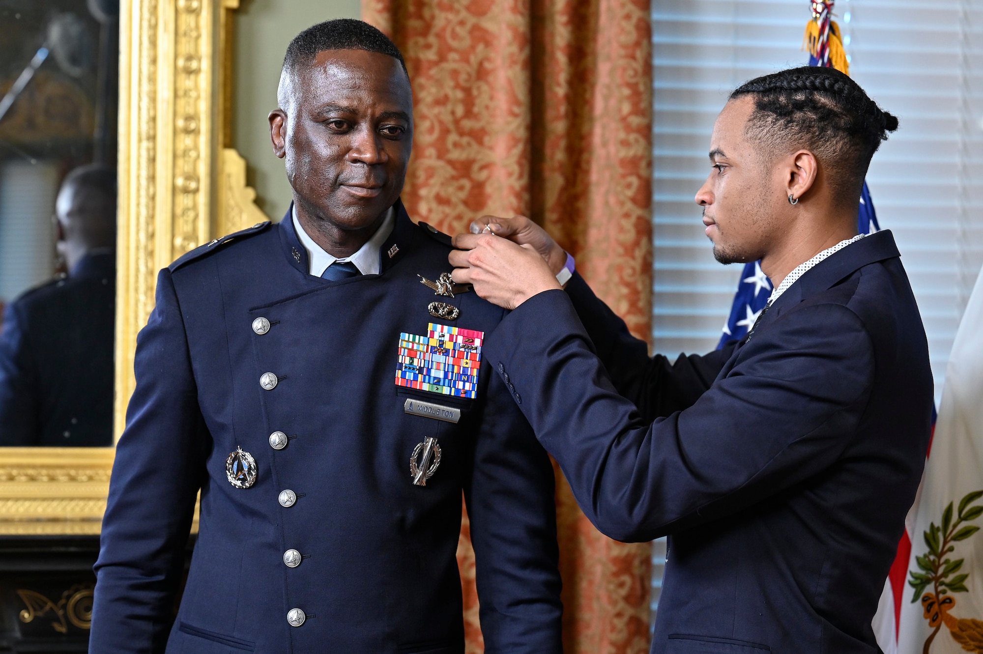 Space Force Brig. Gen. Jacob Middleton has his new rank pinned on during his promotion at the Eisenhower Executive Office Building, Washington, D.C., April 4, 2023. Middleton is the director of national security space policy for the National Space Council. (U.S. Air Force photo by Eric Dietrich)