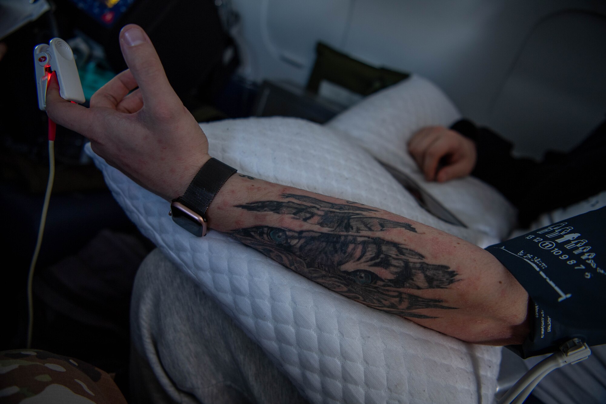 A patient receives treatment during the U.S. Air Force’s first-ever Aeromedical Evacuation paramedic-led flight in charge of an all-enlisted medical crew at Vilnius International Airport, Lithuania, on a flight to Ramstein Air Base, Germany, April 6, 2023.