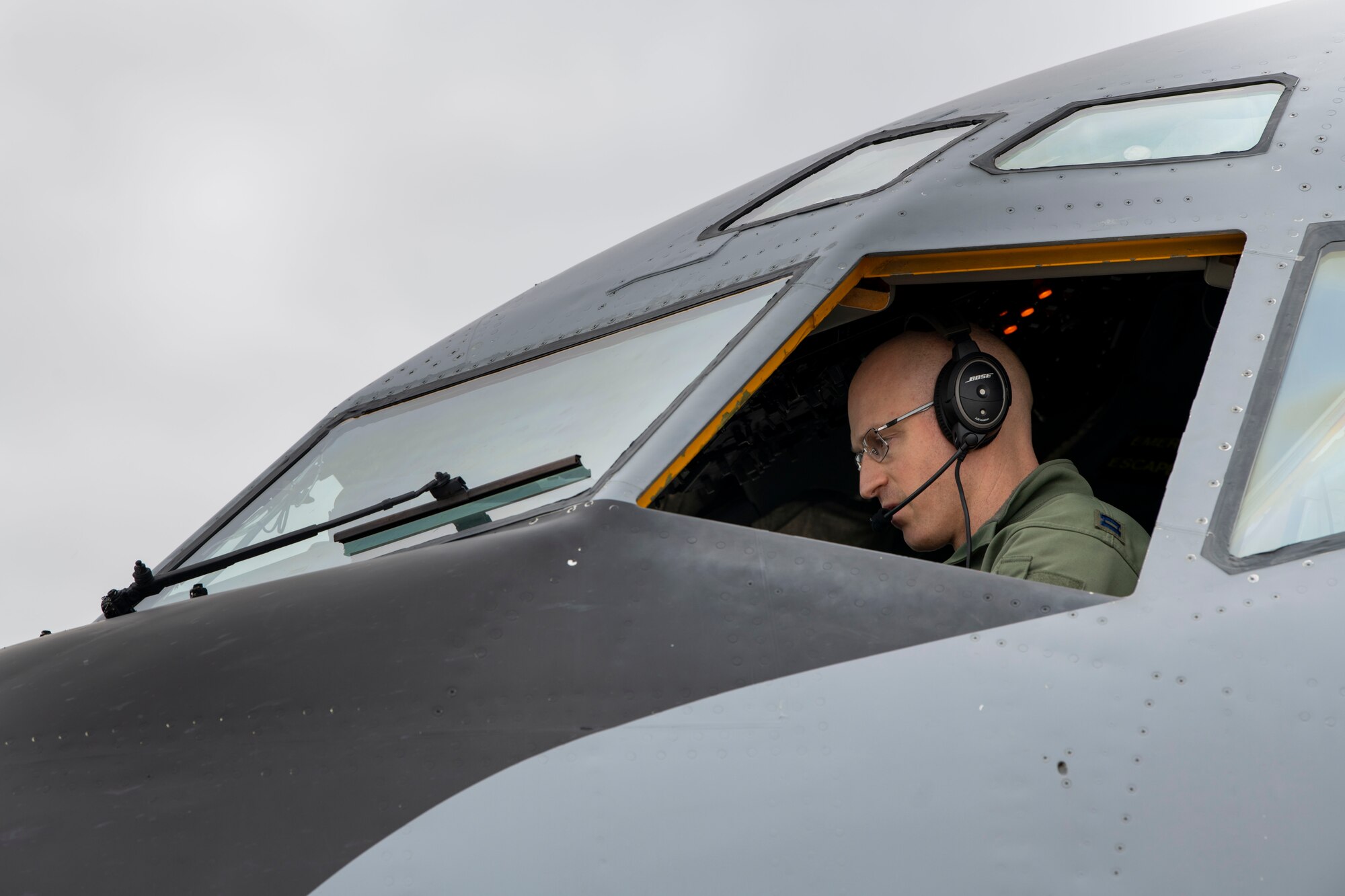 U.S. Air Force Reserve Capt. Jarred Logan, 465th Air Refueling Squadron KC-135 pilot, conducts preflight checks on a KC-135 Stratotanker for in-flight refueling operations during a total force training event