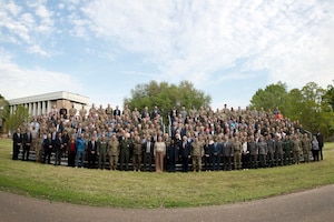 Senior leaders and Schriever Wargame 2023 participants pose for a group photo following the conclusion of the wargame at Maxwell Air Force Base, Alabama, March 31, 2023. Approximately 350 military, civilian, and commercial experts, from more than 25 commands and agencies throughout the U.S. Government, as well as international partners from Australia, Canada, France, Germany, Japan, New Zealand, the United Kingdom, and 14 commercial service providers participated in the wargame. (U.S. Space Force photo by Judi Tomich)