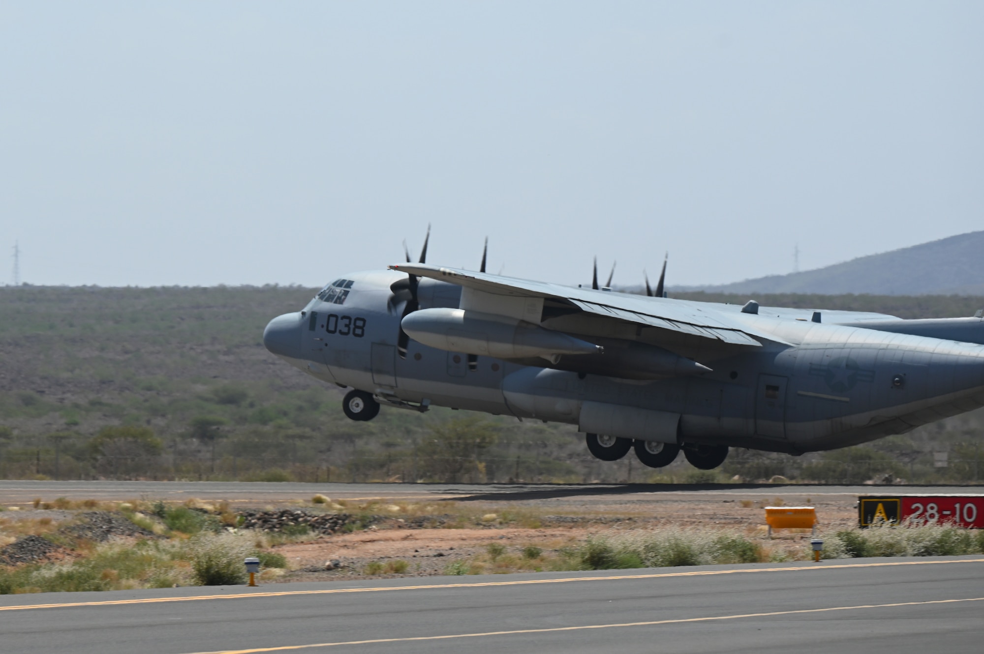 A U.S. Marine Corps KC-130J takes off in support of a simulated Forward Arming and Refueling Point (FARP) exercise at Chabelley Airfield, Djibouti, Feb. 22, 2023. The ability of a Joint Force Commander to move their forces fluidly across the theater to seize, retain and utilize initiatives against an adversary is key to ensuring readiness and resilience, and protecting assets and personnel. (U.S. Air Force photo by Tech. Sgt. Jayson Burns)