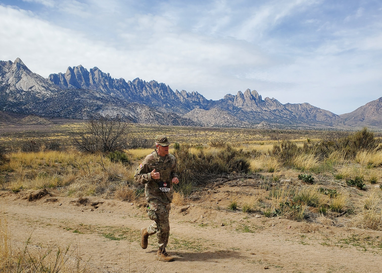 zCol. Brian Coleman, Oklahoma Army National Guard, competes in the military light division at the 2023 Bataan Memorial Death March at White Sands Missile Range, New Mexico, March 19, 2023. Coleman competed in the military light division, which is 26.2 miles in a full military uniform and finished 7th overall with a time of 5:59:51. (U.S. National Guard photo by Sgt. Gauret Stearns)