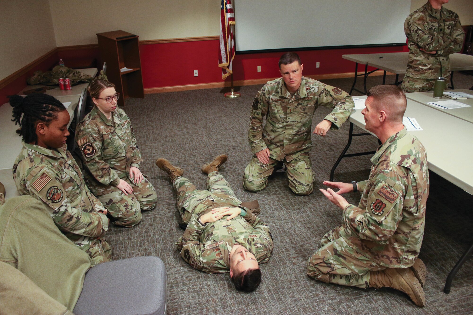 Tech. Sgt. Matt Crotty, right, 445th Aeromedical Staging
Squadron medical technician, trains 445th Airlift Wing
members on how to conduct rapid casualty assessment
during a Tactical Combat Casualty Care course, March
12, 2023. Nearly 50 Airmen completed TCCC in March.