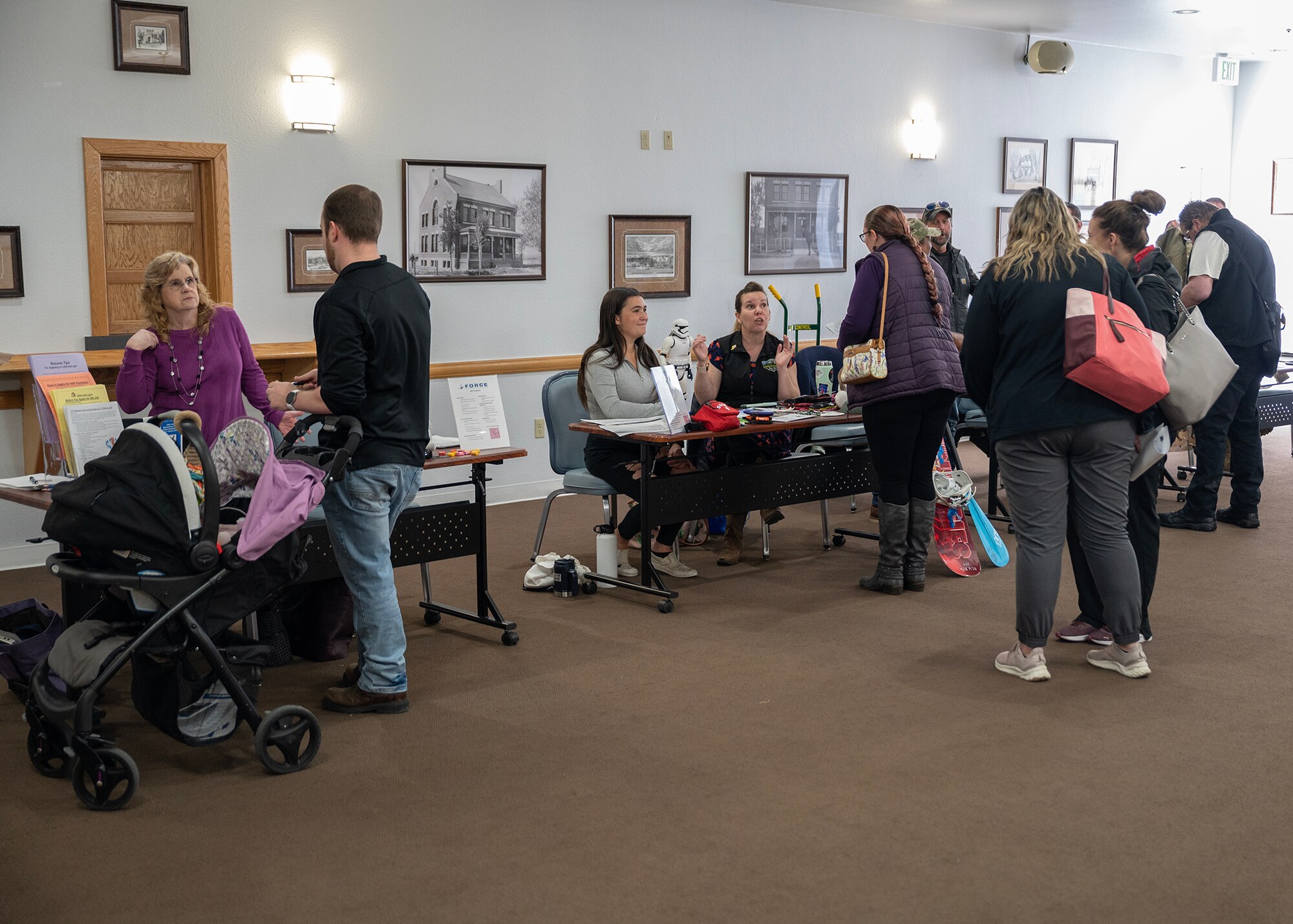 people walking around a job fair