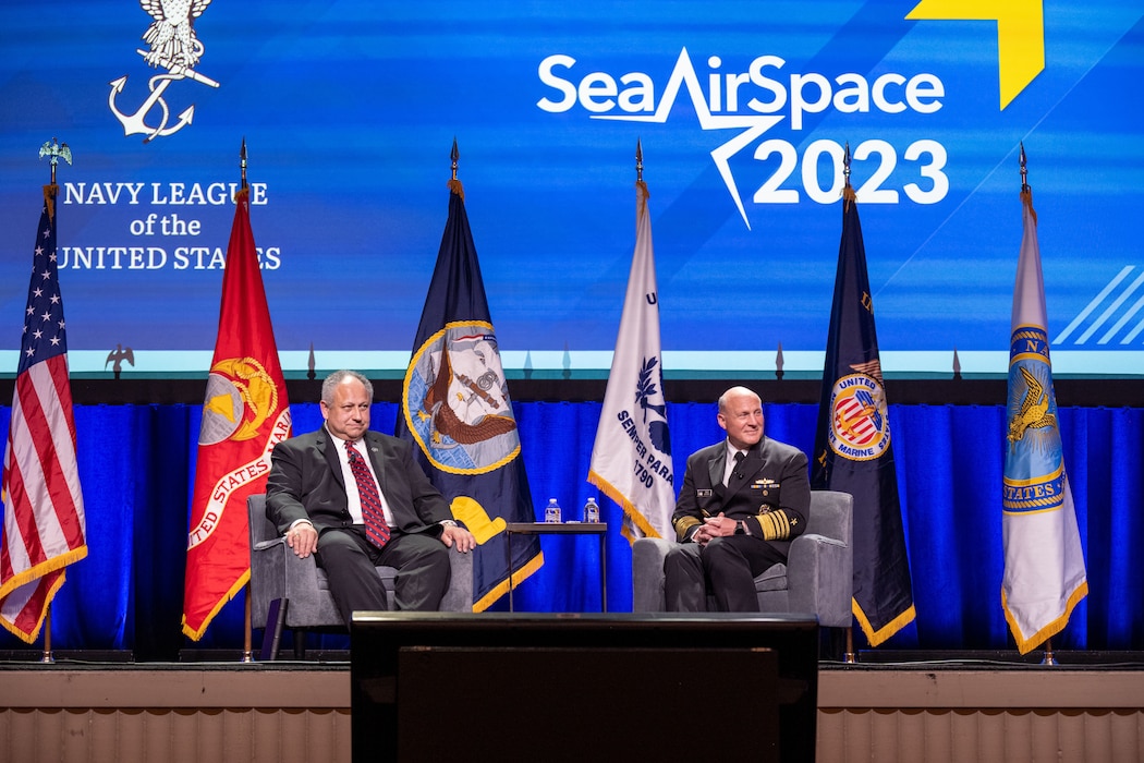 NATIONAL HARBOR, Md. (April 4, 2023) - Chief of Naval Operations Adm. Mike Gilday speaks alongside Secretary of the Navy Carlos Del Toro during a Navy League Luncheon at the 2023 Sea-Air- Space Exposition held at the Gaylord National Resort and Convention Center, April 4. The Sea-Air-Space Exposition is an annual event that brings together key military decision makers, the U.S. defense industrial base and private-sector U.S. companies for an innovative and educational maritime based event. (U.S. Navy photo by Mass Communication Specialist 1st Class Michael B. Zingaro/Released)