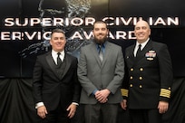 IMAGE: Naval Surface Warfare Center Dahlgren Division (NSWCDD) Technical Director Dale Sisson Jr., SES, and Commanding Officer Capt. Philip Mlynarski presented Daniel Belcher with the Navy Meritorious Civilian Service Award during the NSWCDD Annual Honorary Awards ceremony at the Fredericksburg Expo & Conference Center March 10.