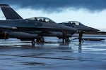 U.S. Air Force Maj. Andrew “Chaos” Davis, pilot, 120th Fighter Squadron,140th Wing, Colorado Air National Guard operates an F-16 Fighting Falcon while Tech. Sgt. Blake Dullinger, aerospace ground equipment technician, and Tech Sgt. Ryan Maschak, electrical and environmental Systems technician, 140th Maintenance Squadron, prepare the aircraft during an Agile Combat Employment wartime scenario at Hill Air Force Base, Utah Jan. 10, 2023. The 140th Wing volunteered to help meet the requirements of the Aging and Surveillance Program and the Center Test Authority at Hill AFB, while simultaneously accomplishing the ACE wartime scenario. (U.S. Air National Guard photo by Tech. Sgt. Chance Johnson)