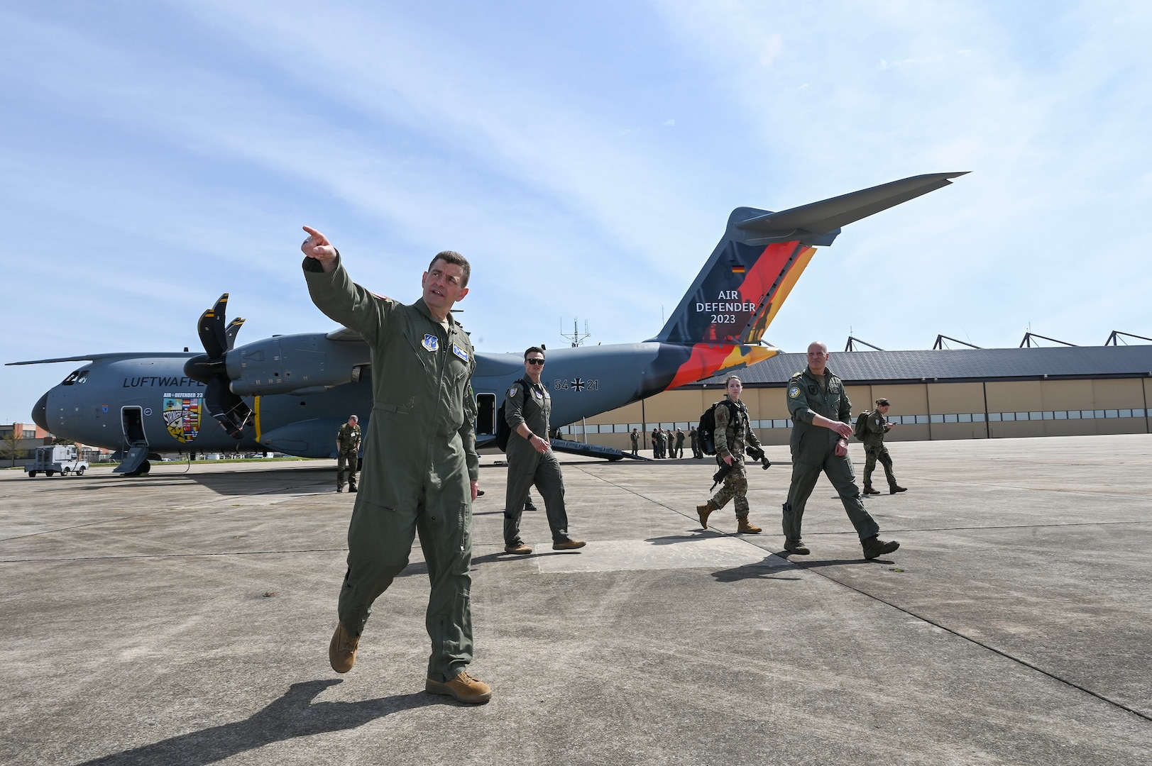 U.S. Air Force Lt. Gen. Michael Loh, front center, director, Air National Guard, tours the flightline during Air Defender 2023 Media Day, Joint Base Andrews, Maryland, April 4, 2023. Members of the German air force and media visited in preparation for Air Defender 2023 in June.