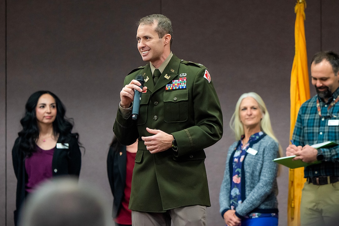 Lt. Col. Jerre Hansbrough, commander, USACE-Albuquerque District speaks to representatives from regional large and small businesses during a Business Opportunities Open House at the Albuquerque Convention Center, March 30, 2023.