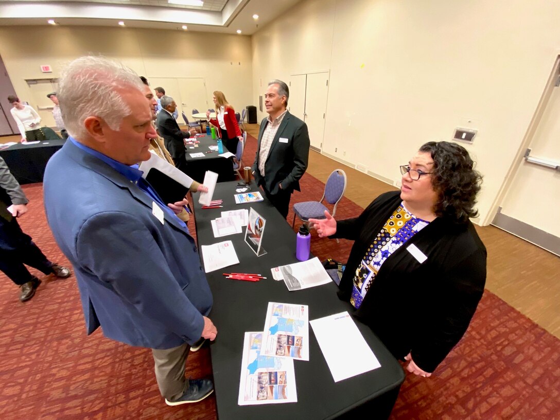 Representatives from regional large and small businesses speak with U.S. Army Corps of Engineers-Albuquerque District personnel about USACE projects during a Business Opportunities Open House at the Albuquerque Convention Center, March 30, 2023.
