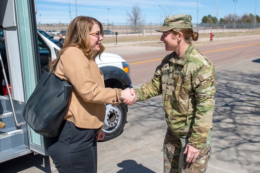  Two women shaking hands