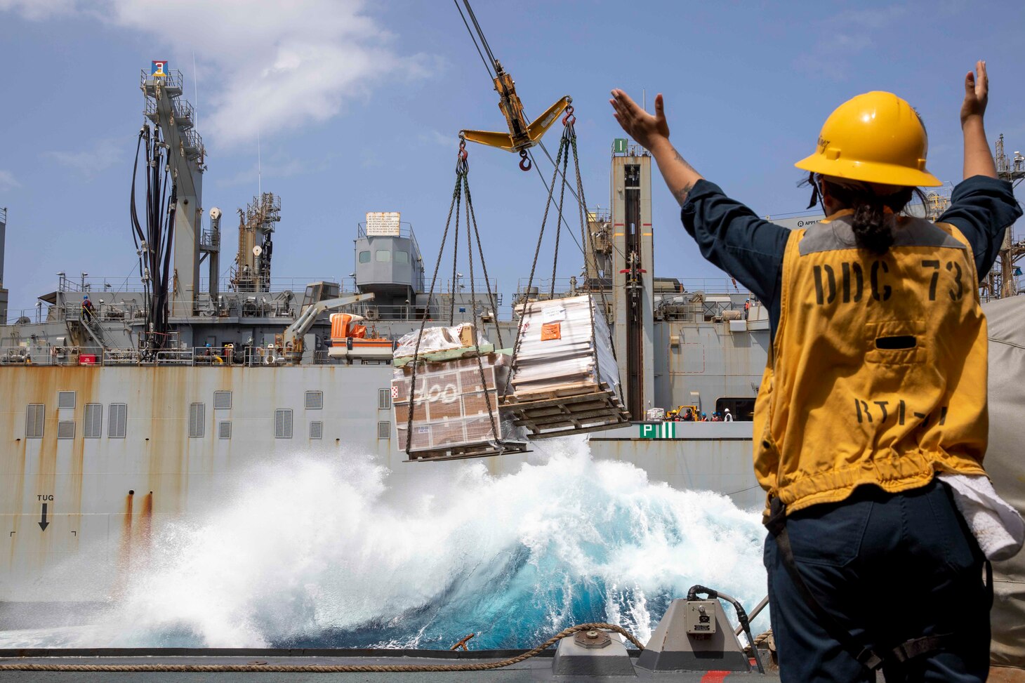 USS Decatur (DDG 73) replenishes from USNS Washington Chambers (T-AKE 11) in the Philippine Sea.