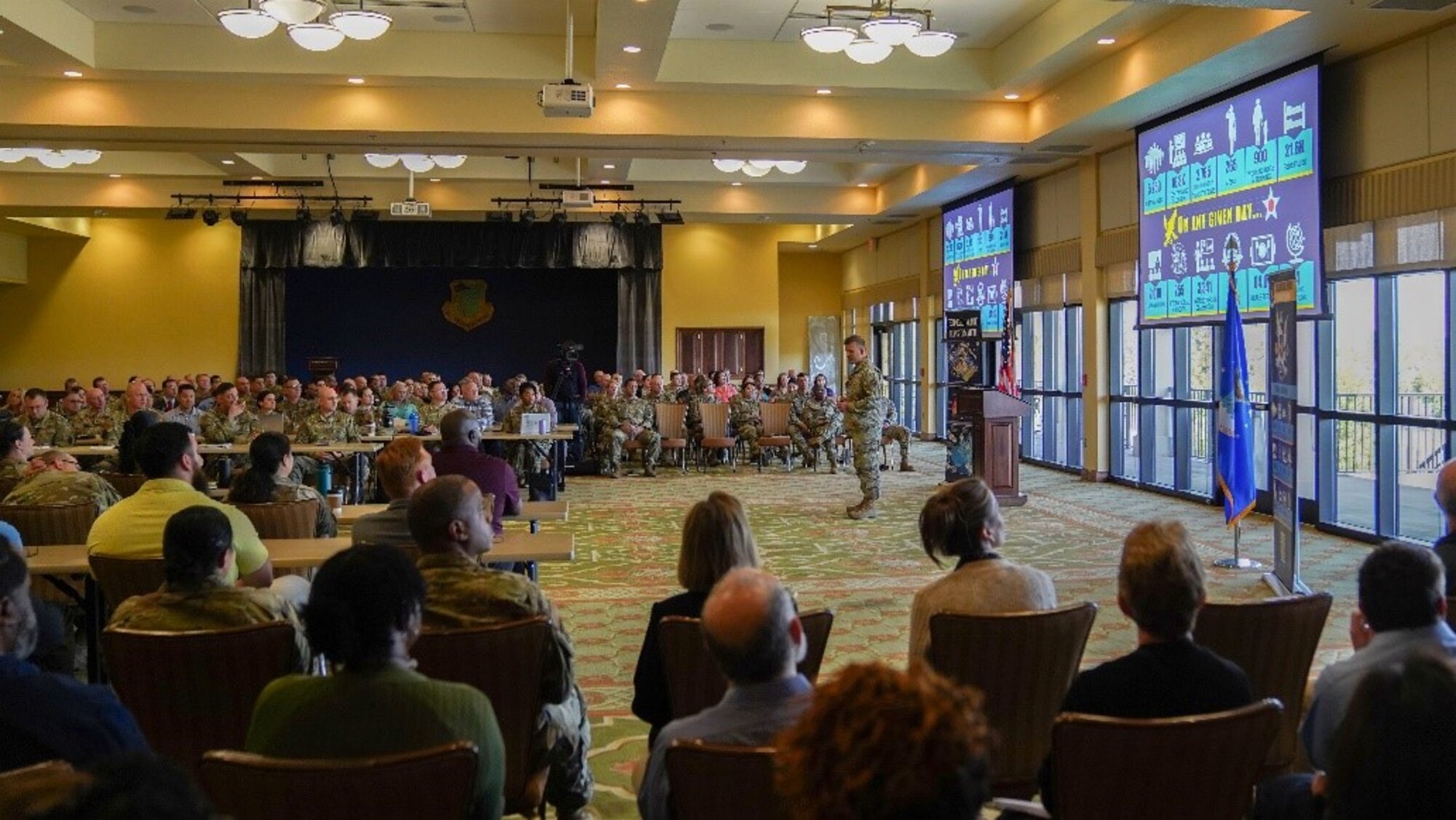 U.S. Air Force Col. Nicholas Dipoma, Second Air Force vice commander, briefs 81st Training Wing leadership and virtual attendees at the Bay Breeze Event Center on Keesler Air Force Base, Mississippi, March 22, 2023