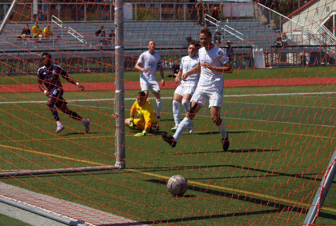 Navy's Seaman Julio Noel of USS Essex scores the opening goal of match 2 featuring Navy v Air Force, of the 2023 Armed Forces Men’s Soccer Championship held at the Paige Fieldhouse Marine Corps Base Camp Pendleton, California on 5 April 2023.  The Armed Forces Men's Soccer Championship hosted by Marine Corps Base Camp Pendleton, California from April 4-11.  The Armed Forces Championship features teams from the Army, Marine Corps, Navy (with Coast Guard runners), and Air Force (with Space Force Runners).  Department of Defense Photo by Mr. Steven Dinote - Released.