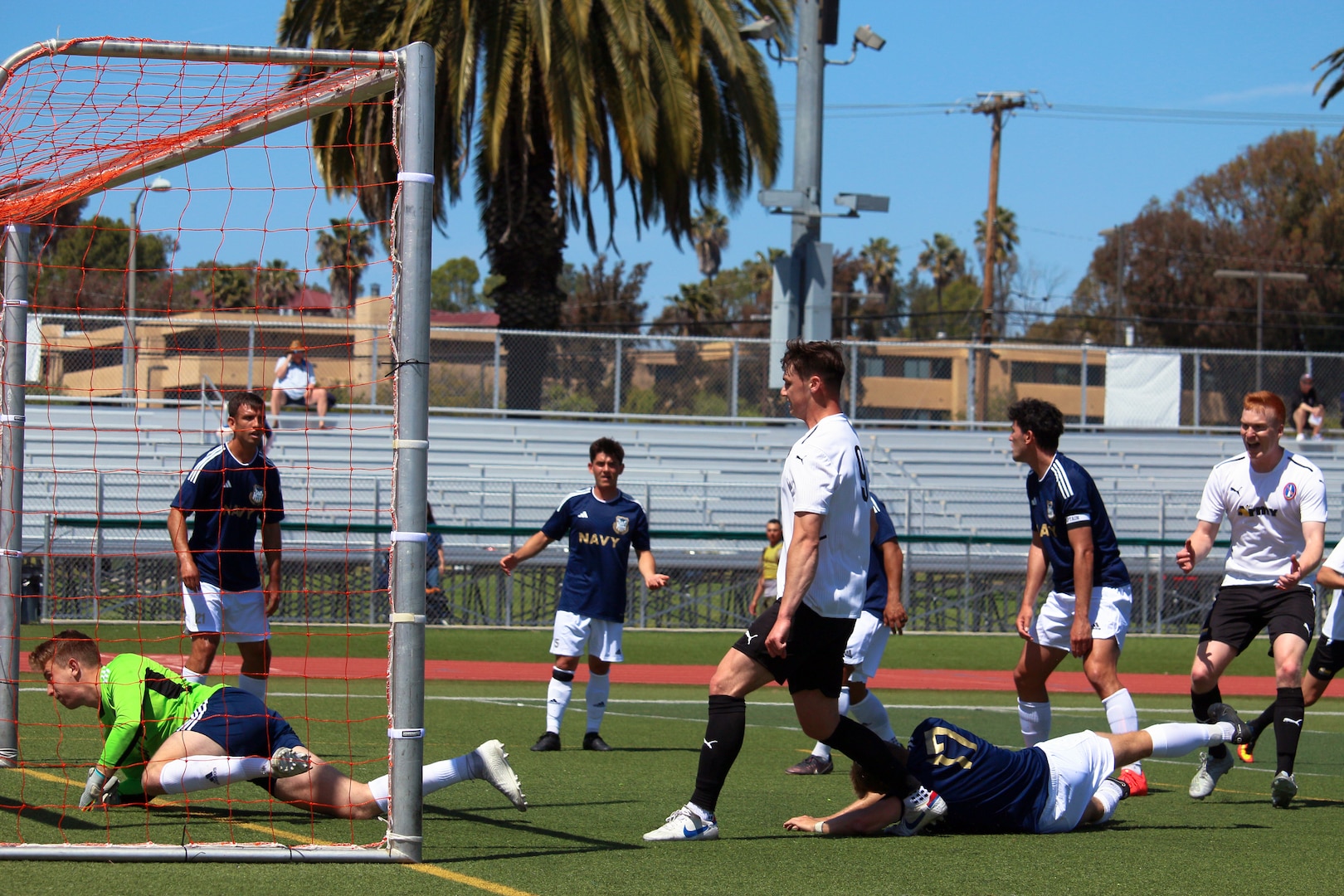 Army 2nd lt. John Poncy (#9) of Fort Hood, Texas scores the winning goal of Match 3 featuring Army v Navy of the 2023 Armed Forces Men’s Soccer Championship held at the Paige Fieldhouse Marine Corps Base Camp Pendleton, California on 7 April 2023.  The Armed Forces Men's Soccer Championship hosted by Marine Corps Base Camp Pendleton, California from April 4-11.  The Armed Forces Championship features teams from the Army, Marine Corps, Navy (with Coast Guard runners), and Air Force (with Space Force Runners).  Department of Defense Photo by Mr. Steven Dinote - Released.