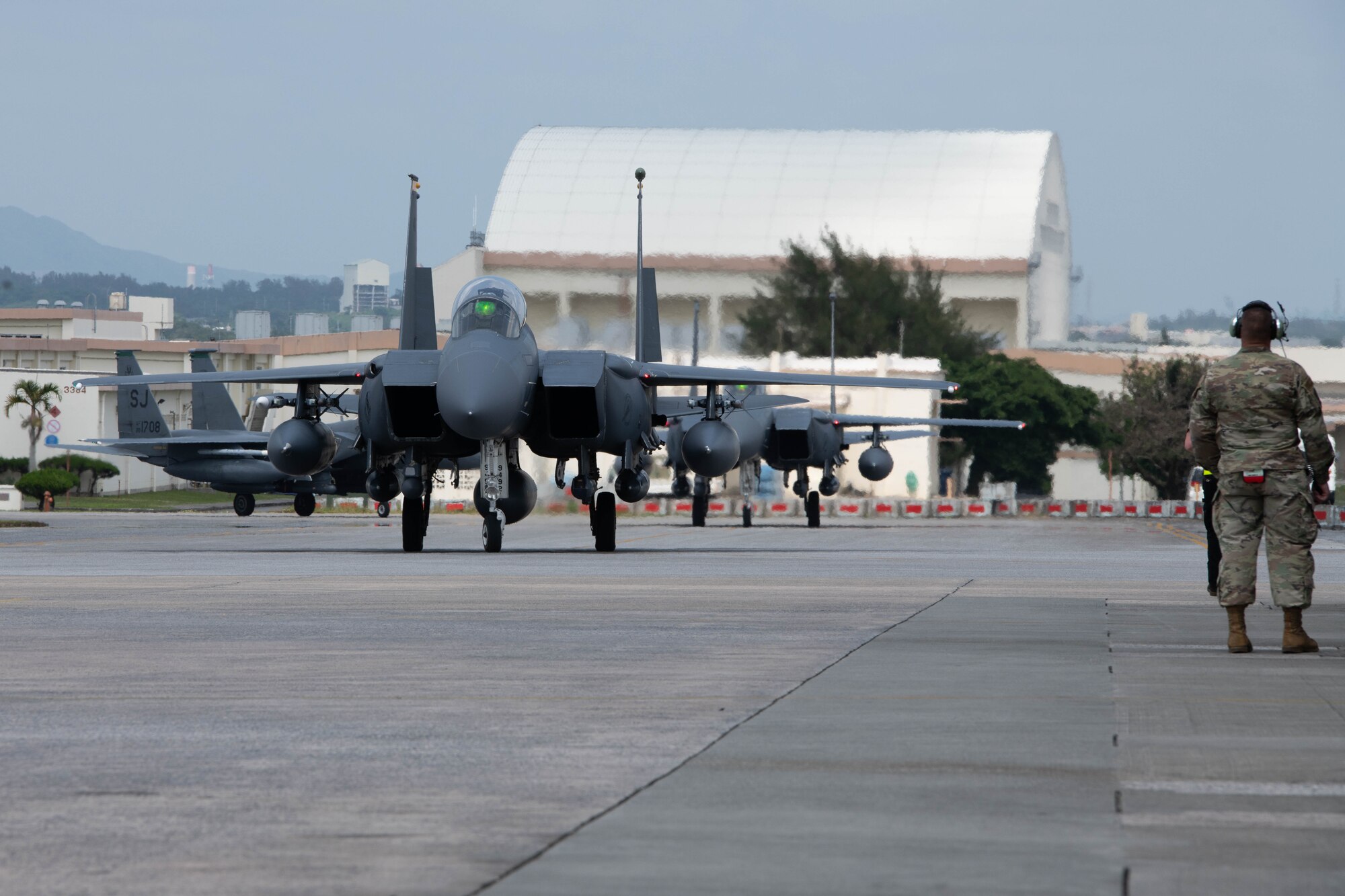 Aircraft taxi on the flightline.