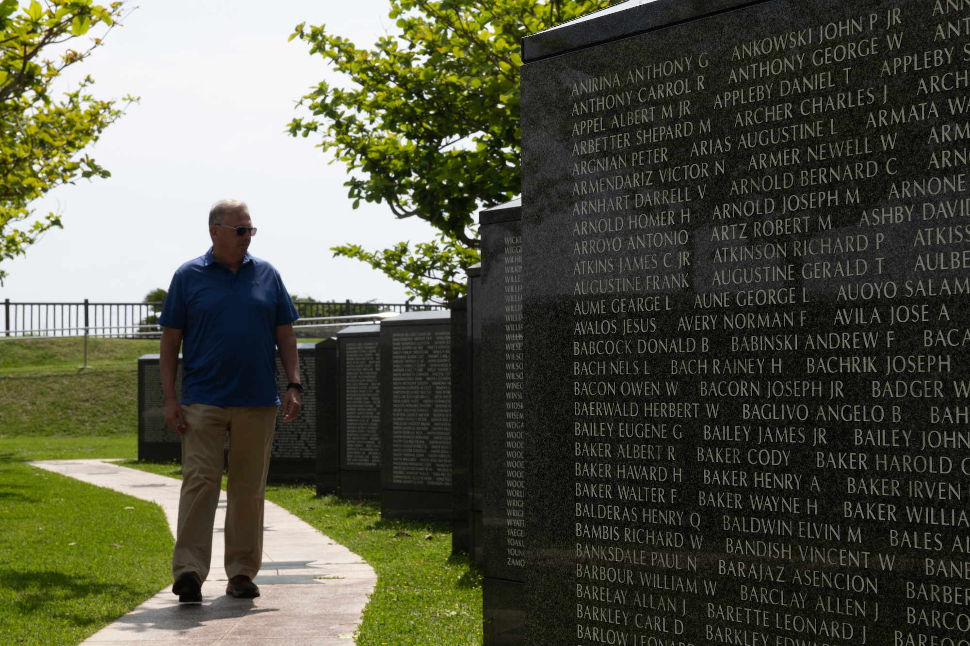 An Airman observes a monument.